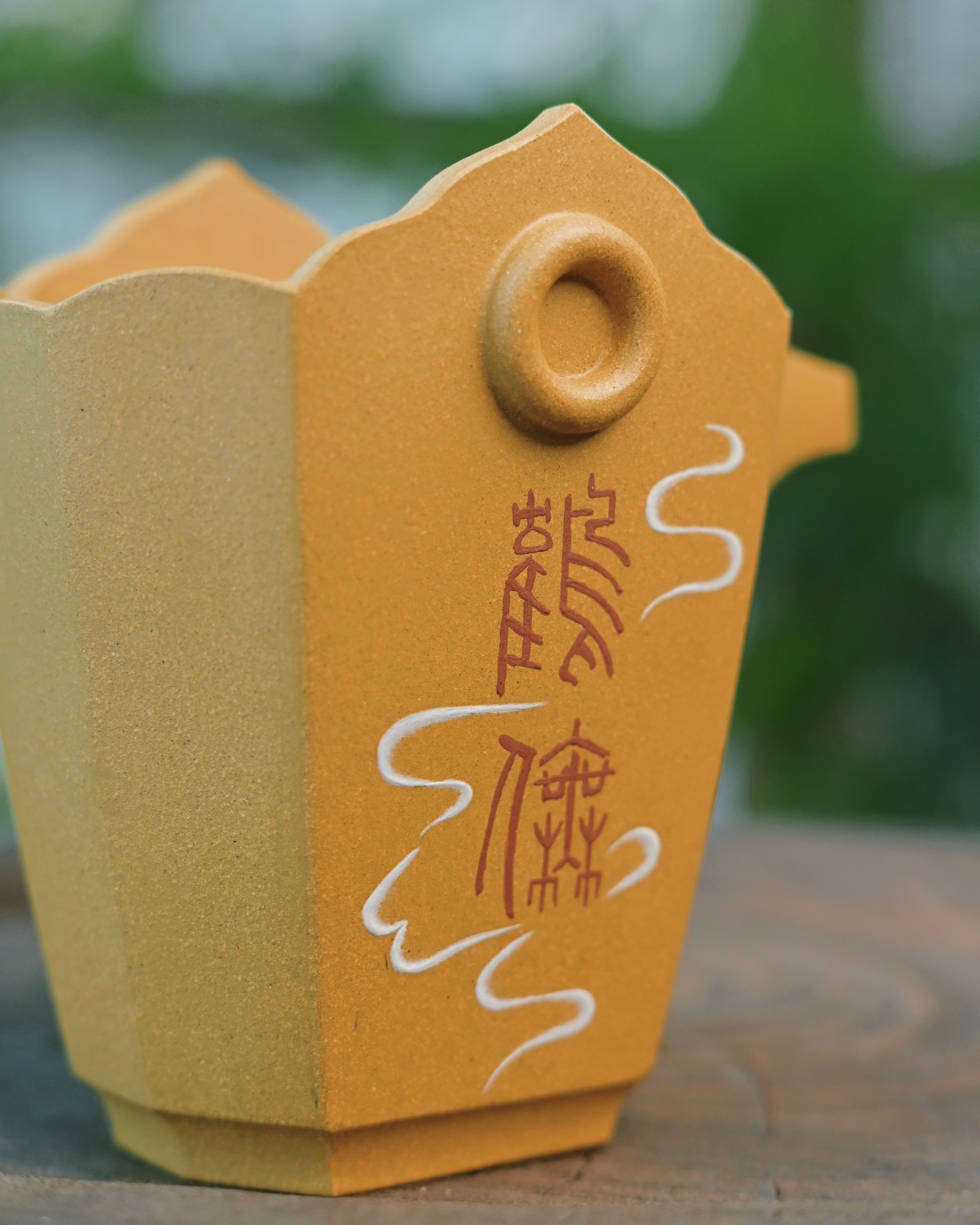 Macro shot of the cup’s surface, capturing the unique hue—yellow with a faint green tinge—after firing by Kungfuyang