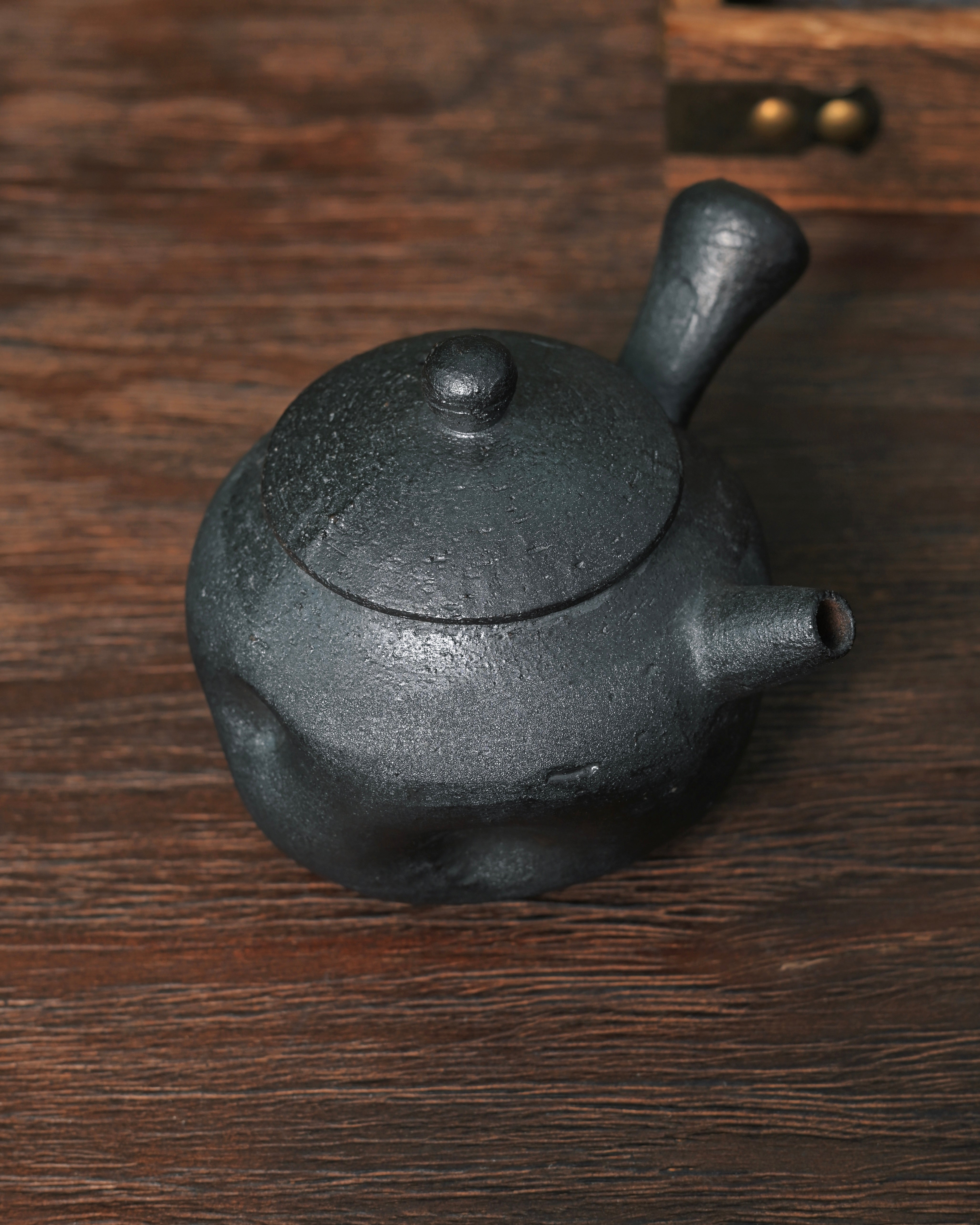 Rustic tactile tea vessel designed for comfortable handling and mindful pouring by Kungfuyang