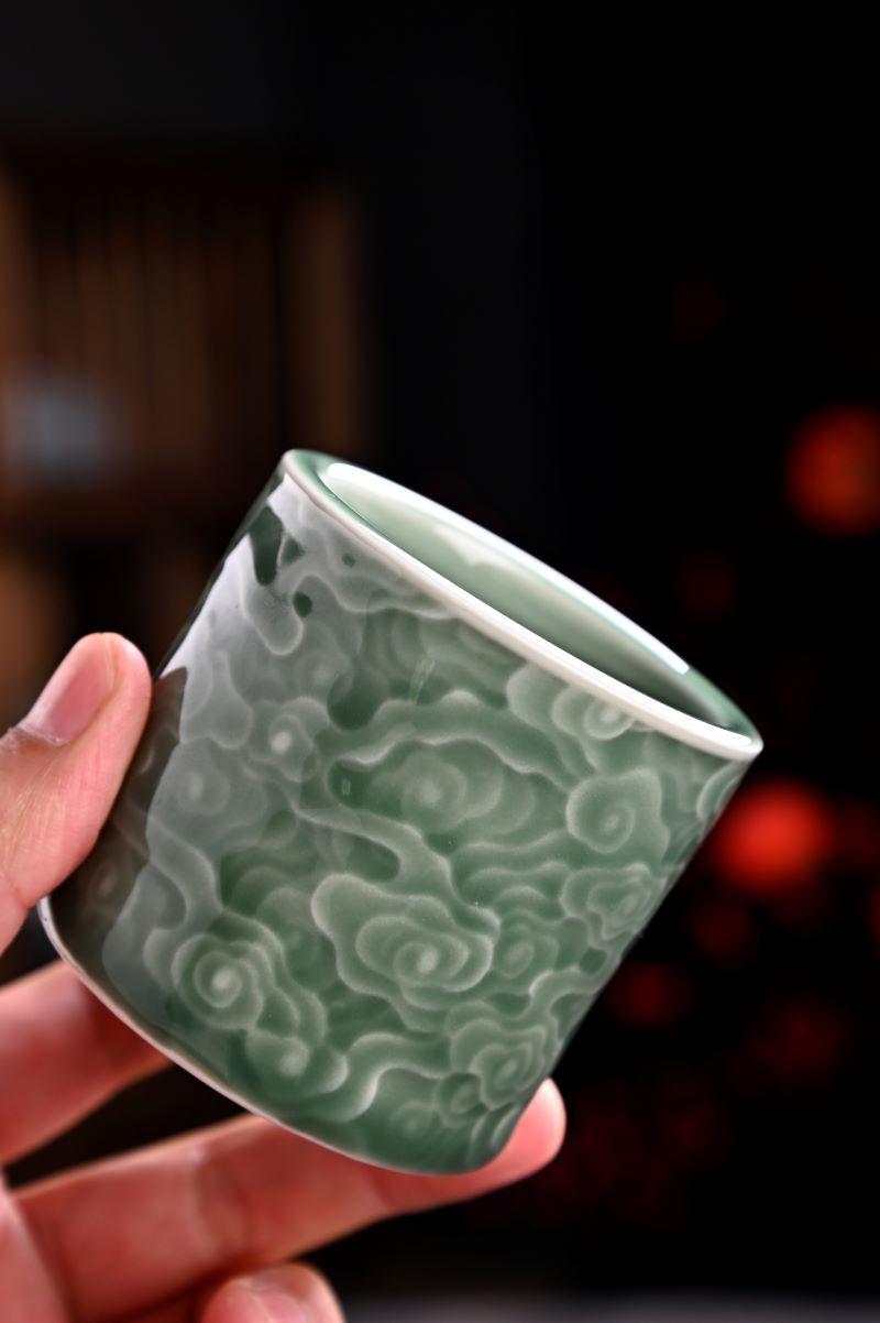 longquan celadon plum green cloud embossed – Longquan Celadon Cloud-Embossed Plum Green Cylinder Cup by Kungfuyang