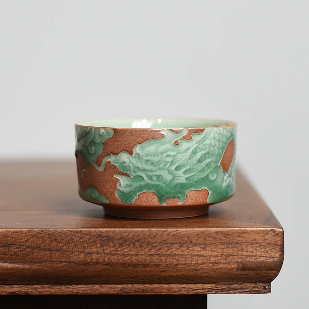 O1CN01hahBee2ILFtaJ62QE – Longquan Celadon Teacup – Handmade Embossed Dragon Design by Kungfuyang