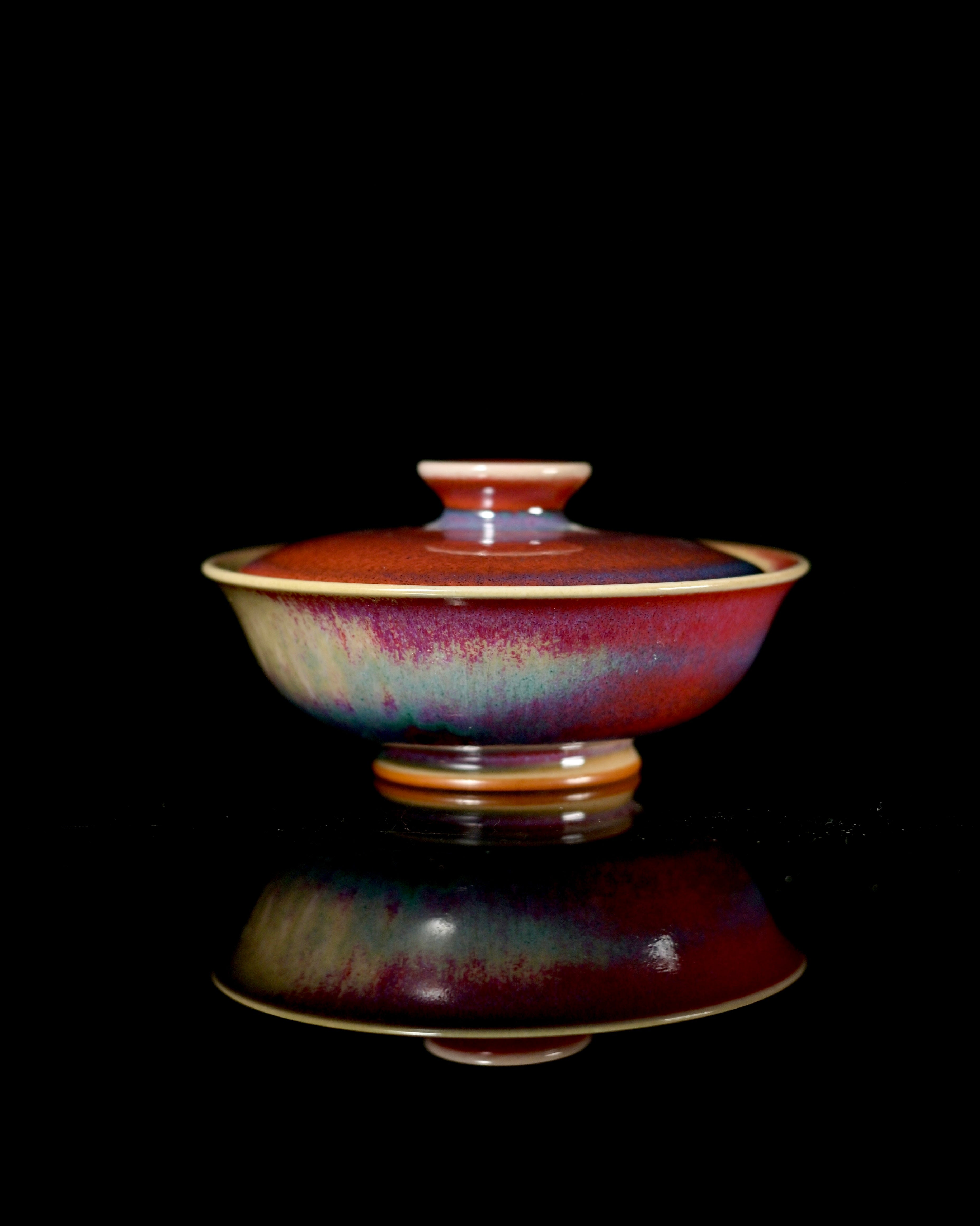 Handmade Jun ware gaiwan showing flowing red and blue kiln transformation glaze by Kungfuyang