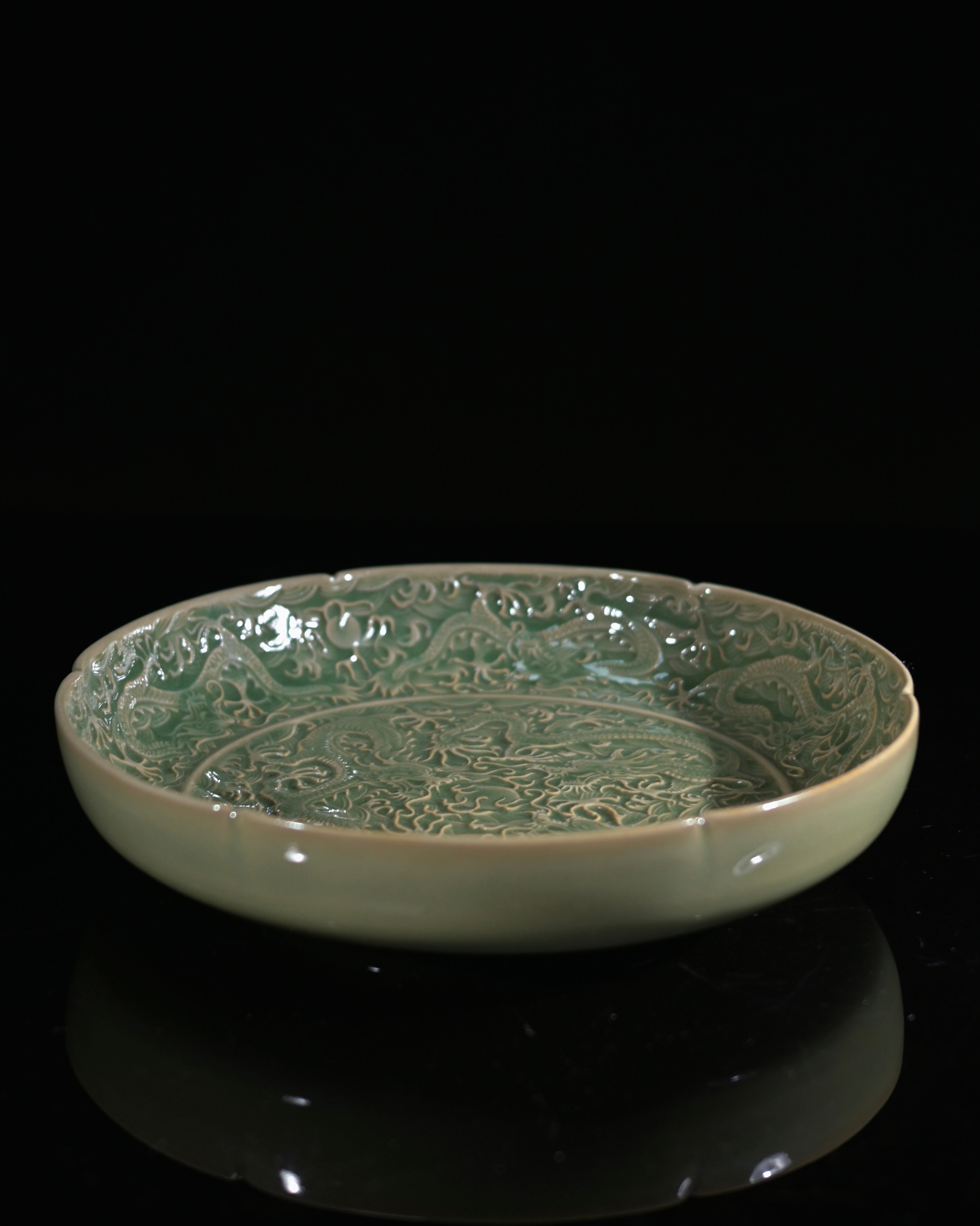 Sharp carved dragon plate from northern Chinese Yaozhou kiln tradition emphasizing decorative by Kungfuyang
