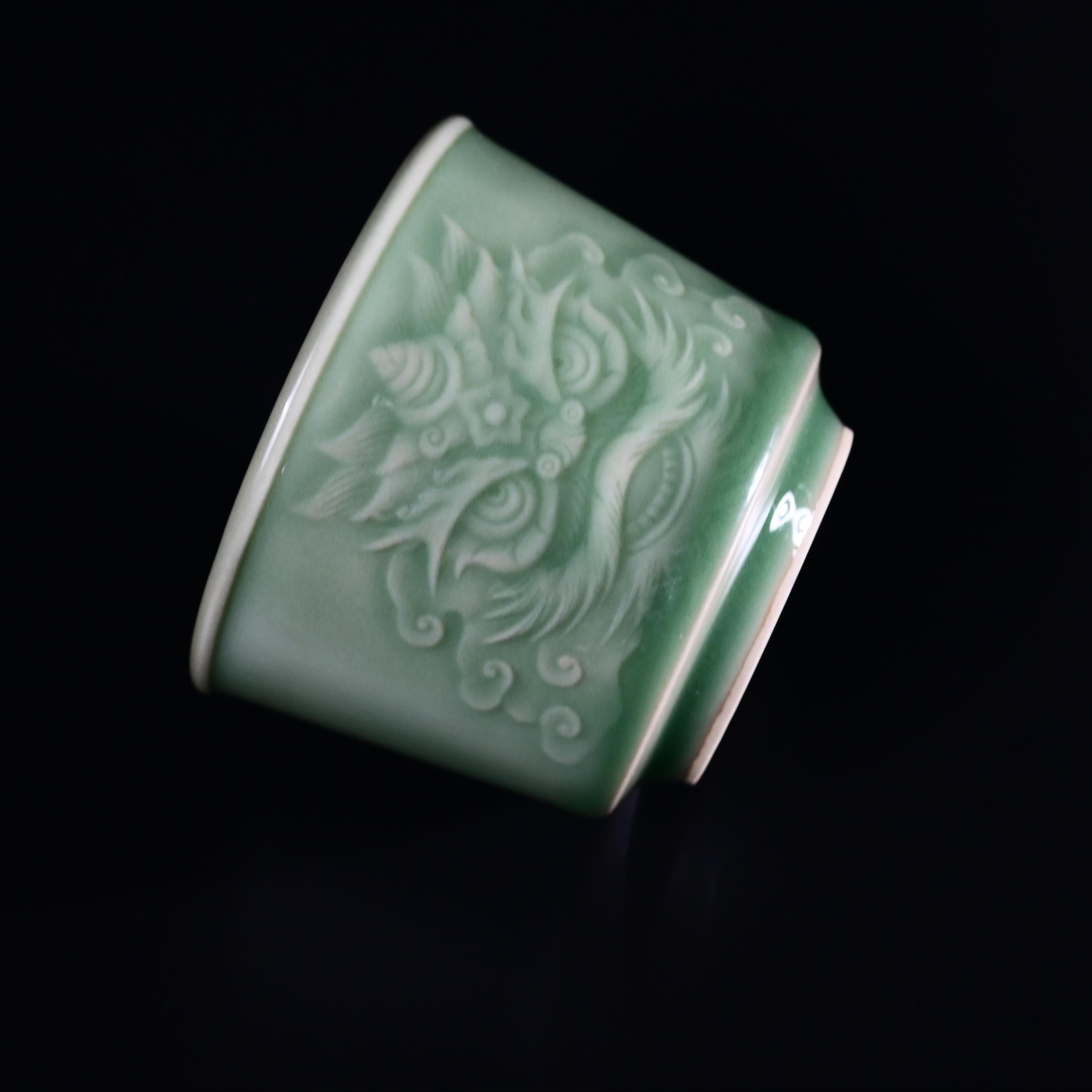 Kungfuyang Longquan Celadon Martial Lion Design Hand-carved Host Teacup, product view 2