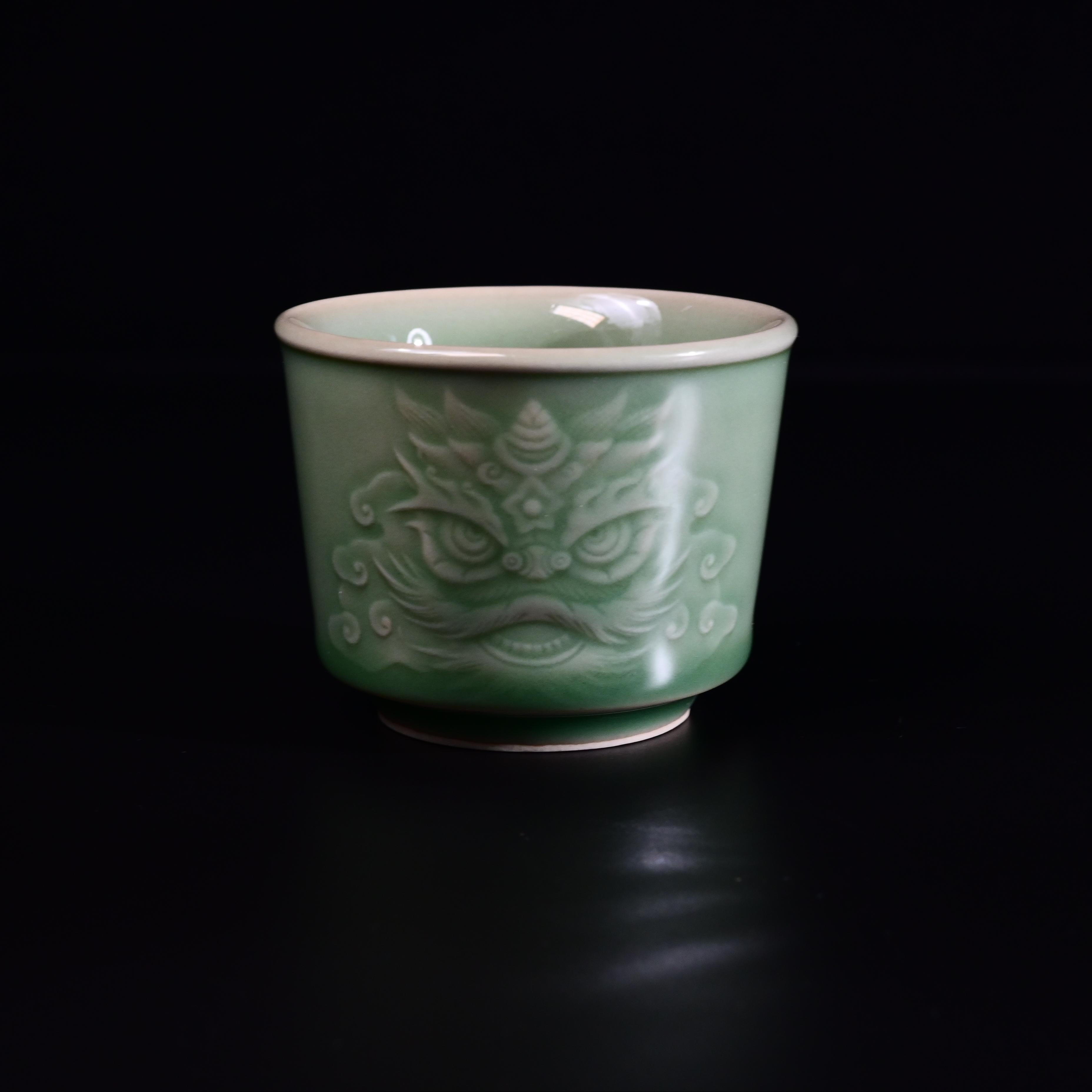 Kungfuyang Longquan Celadon Martial Lion Design Hand-carved Host Teacup, product view 1