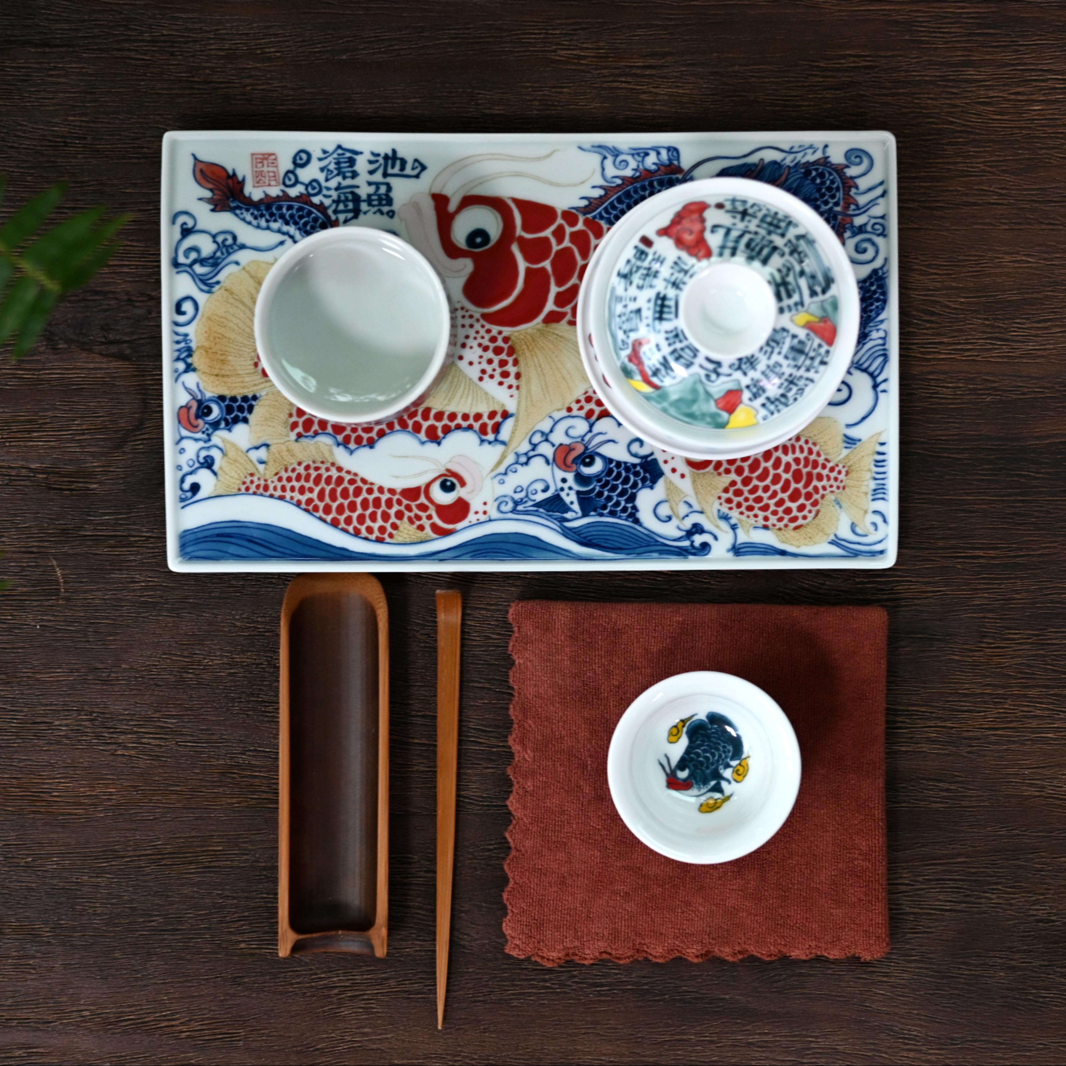 6695 1 f8d818c5 c4e6 4b7d 999d – Underglaze Polychrome Asian Arowana Host Teacup by Kungfuyang