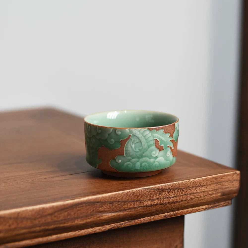 O1CN01TWoGxC2ILFtbrSfWp – Longquan Celadon Teacup – Handmade Embossed Dragon Design by Kungfuyang