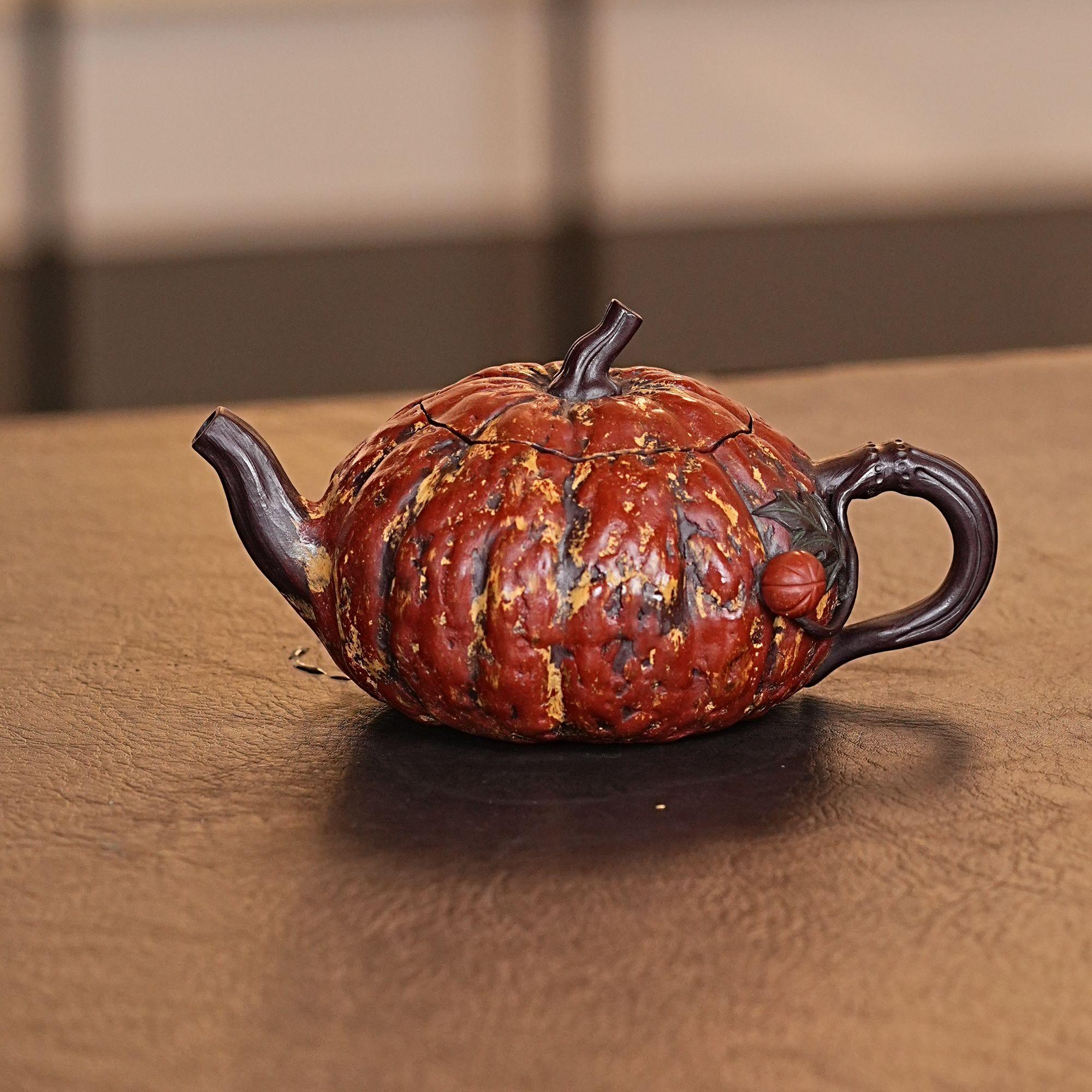 Naturalistic ribbed pumpkin body with hand-carved vertical ridges and upward-sweeping short clay spout by Kungfuyang