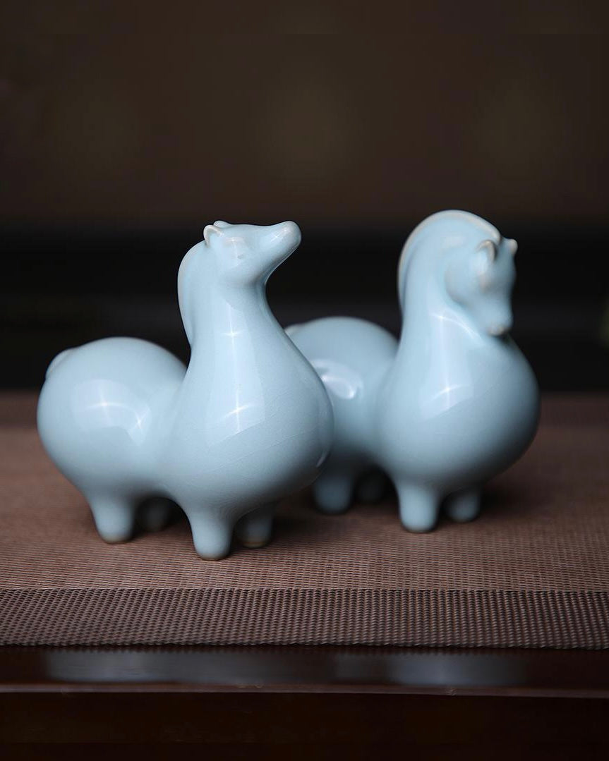 Gongfu tea pet decorative object that sits beside teapot and receives first rinse liquid by Kungfuyang