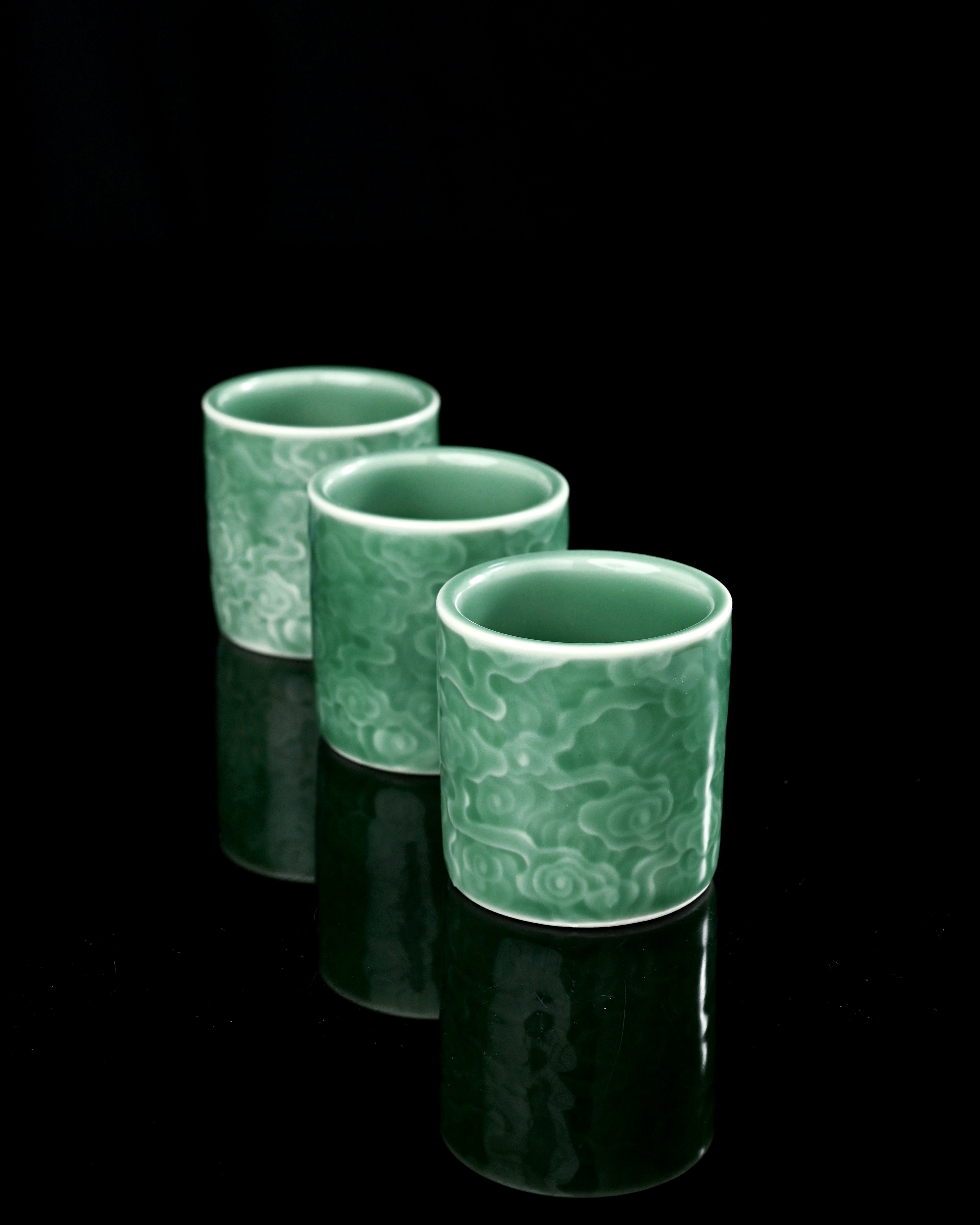 longquan celadon cloud carved plum green – Longquan Celadon Cloud-Embossed Plum Green Cylinder Cup by Kungfuyang