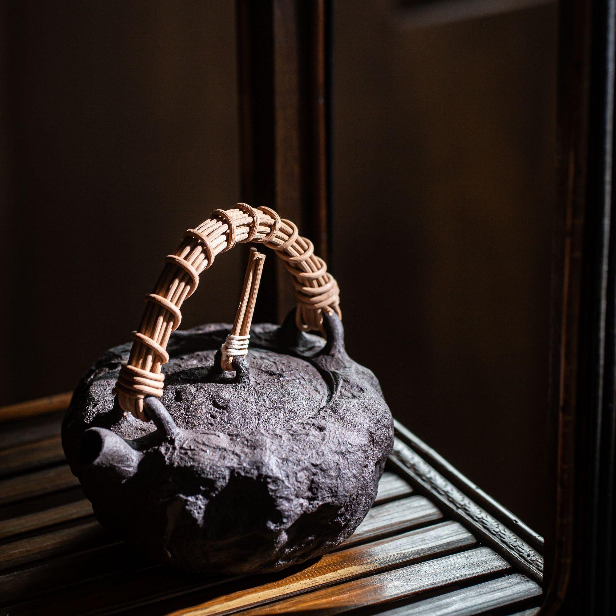 Woven rattan handle integrating organic material with traditional pottery craftsmanship by Kungfuyang
