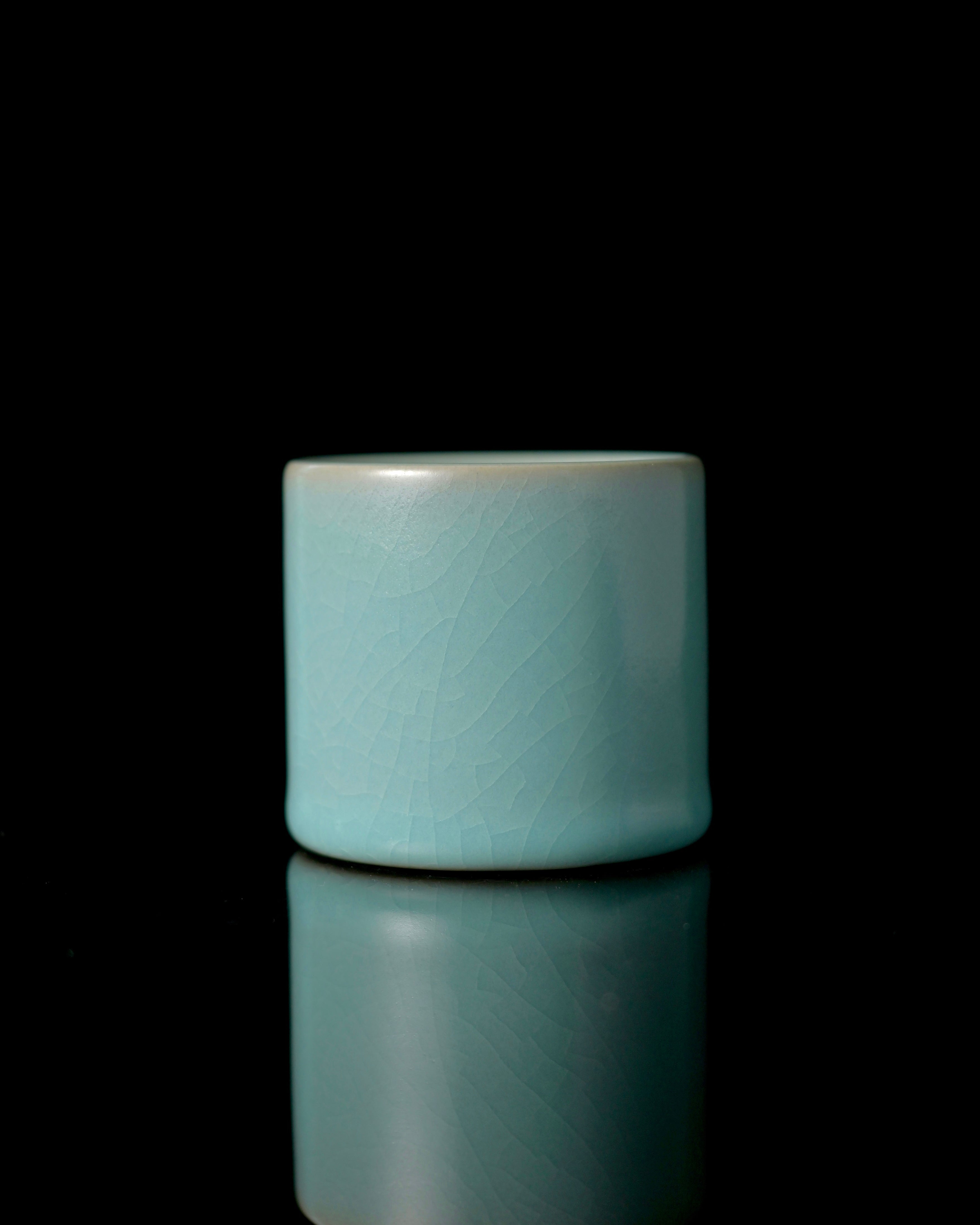 Ru ware porcelain jade-like celadon surface showing soft light transmission and smooth glaze texture by Kungfuyang