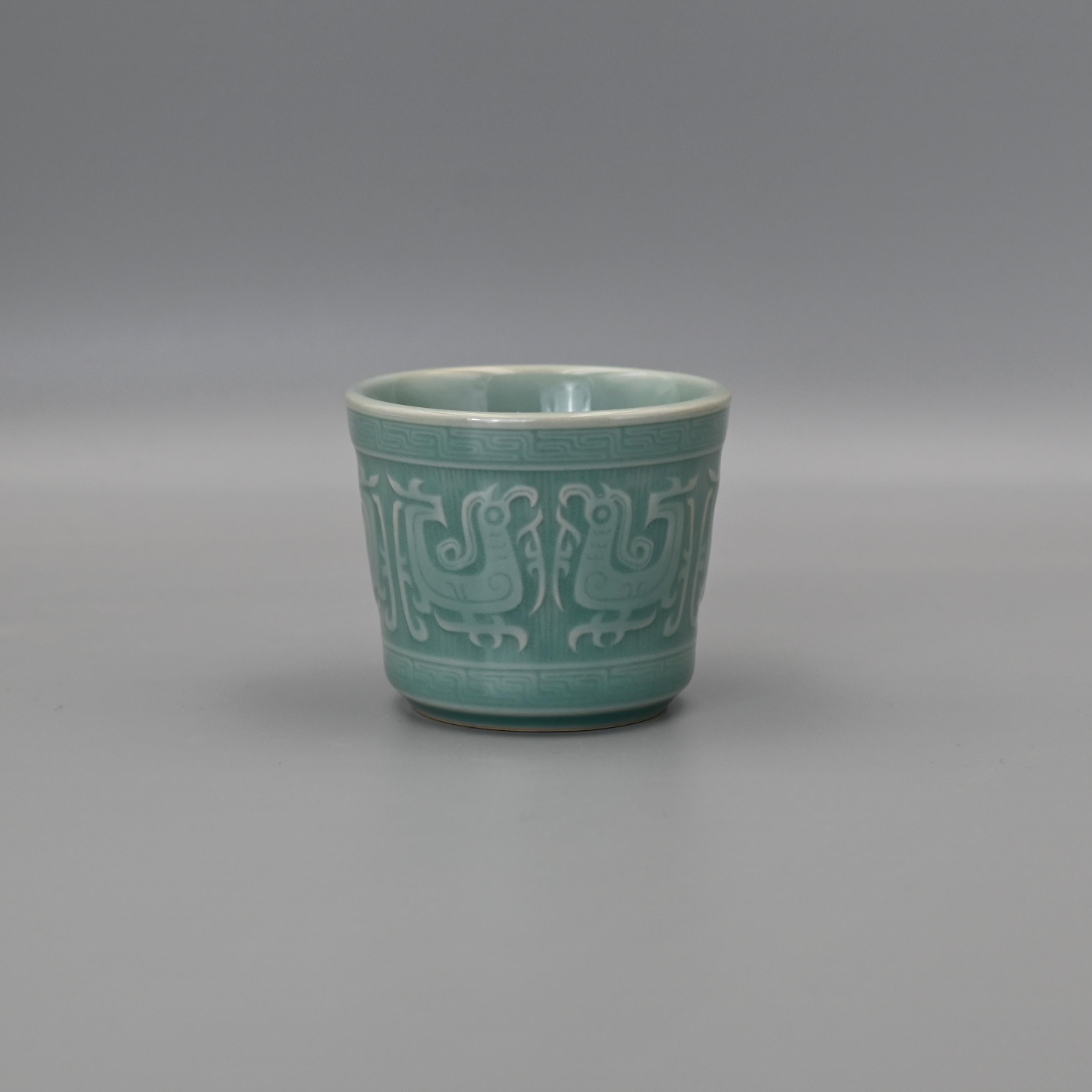 celadon hand carved phoenix teacup – Longquan Celadon Celestial Blue Six-Phoenix Totem Master’s Cup by Kungfuyang