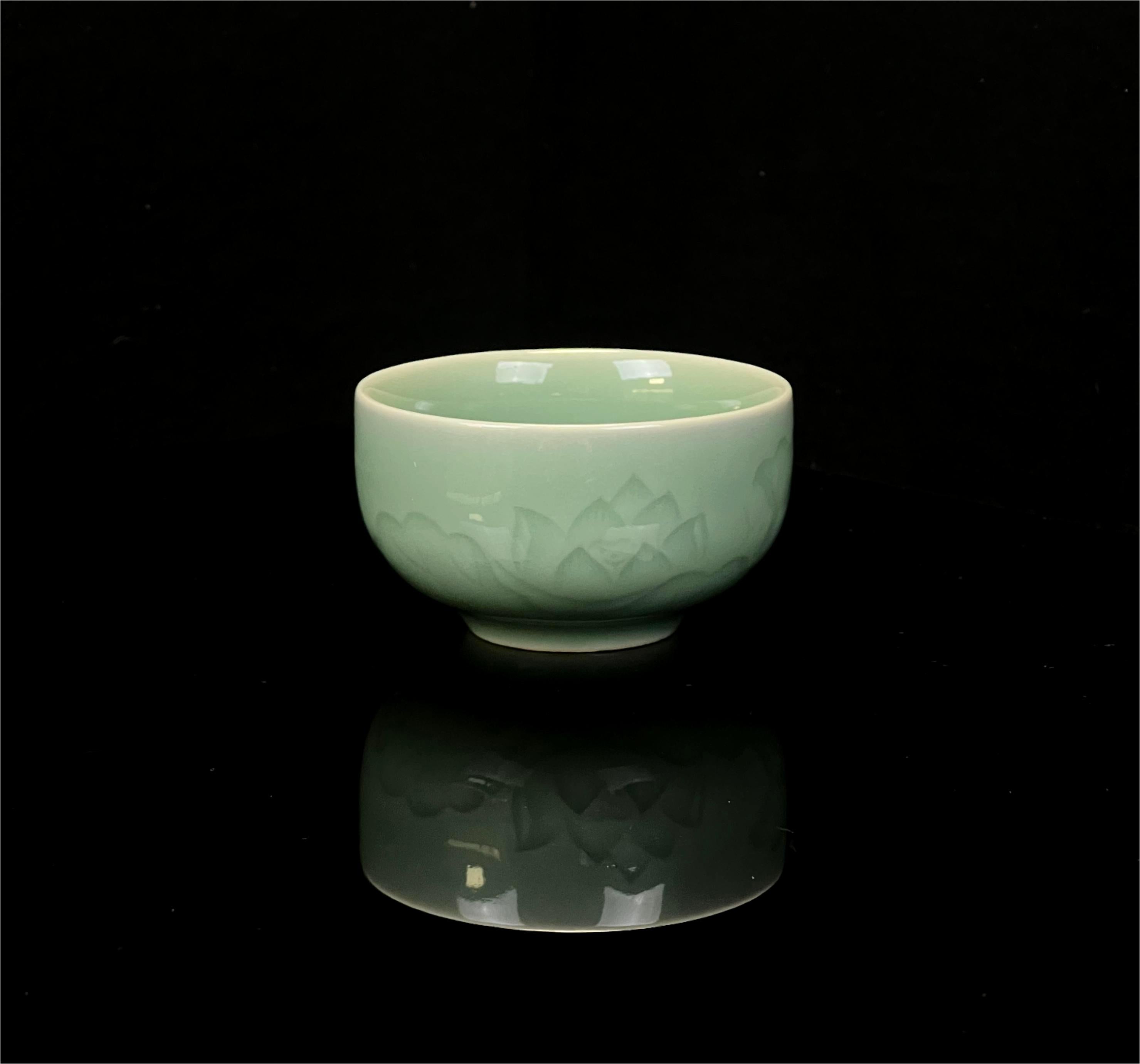 celadon hand carved teacup – Longquan Celadon Lotus Pattern Plum-green Teacup by Kungfuyang
