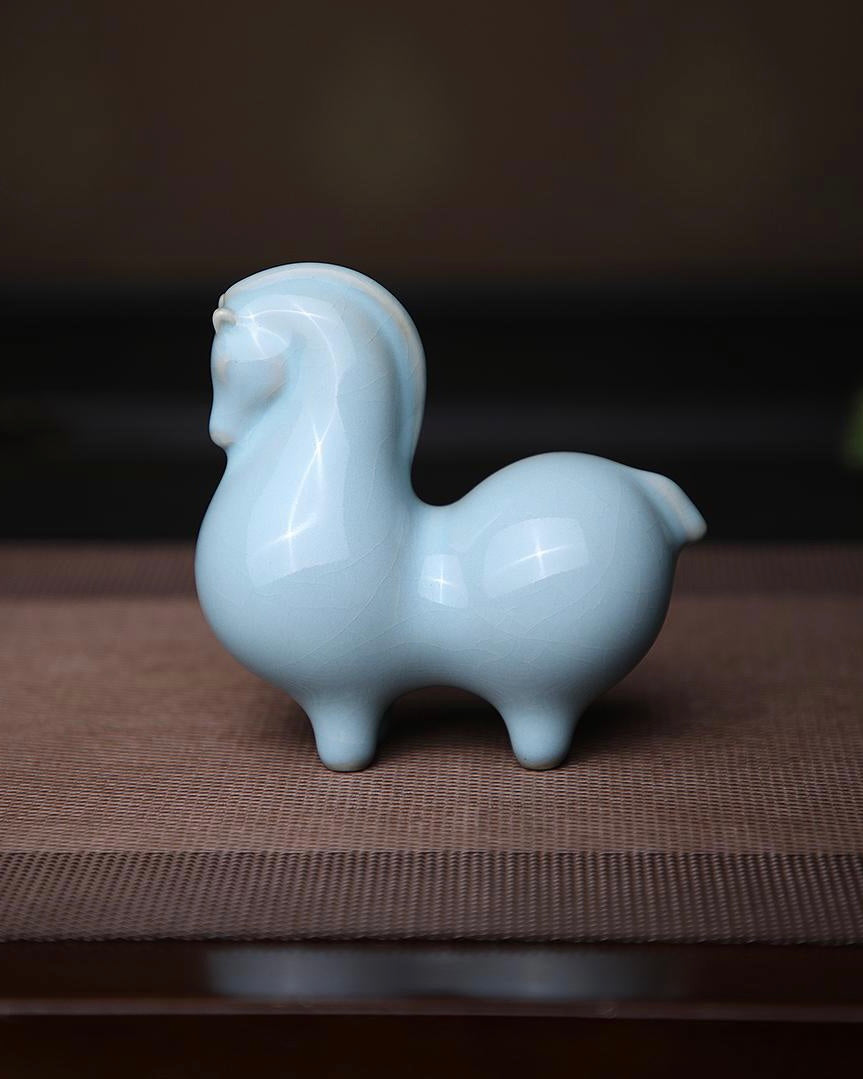 Small ceramic Tang horse in Ru mineral glaze showing soft blue-green color with fine crackle lines by Kungfuyang