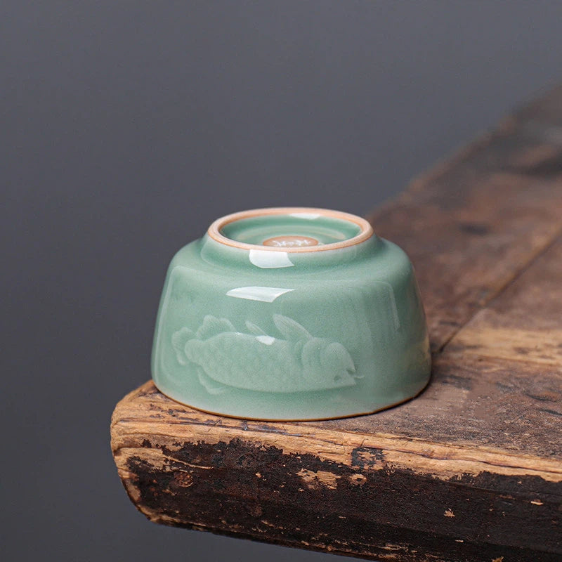 7e73usgnn – Longquan Celadon Dragon-Fish Plum Green Wood Ash Teacup 90ml by Kungfuyang