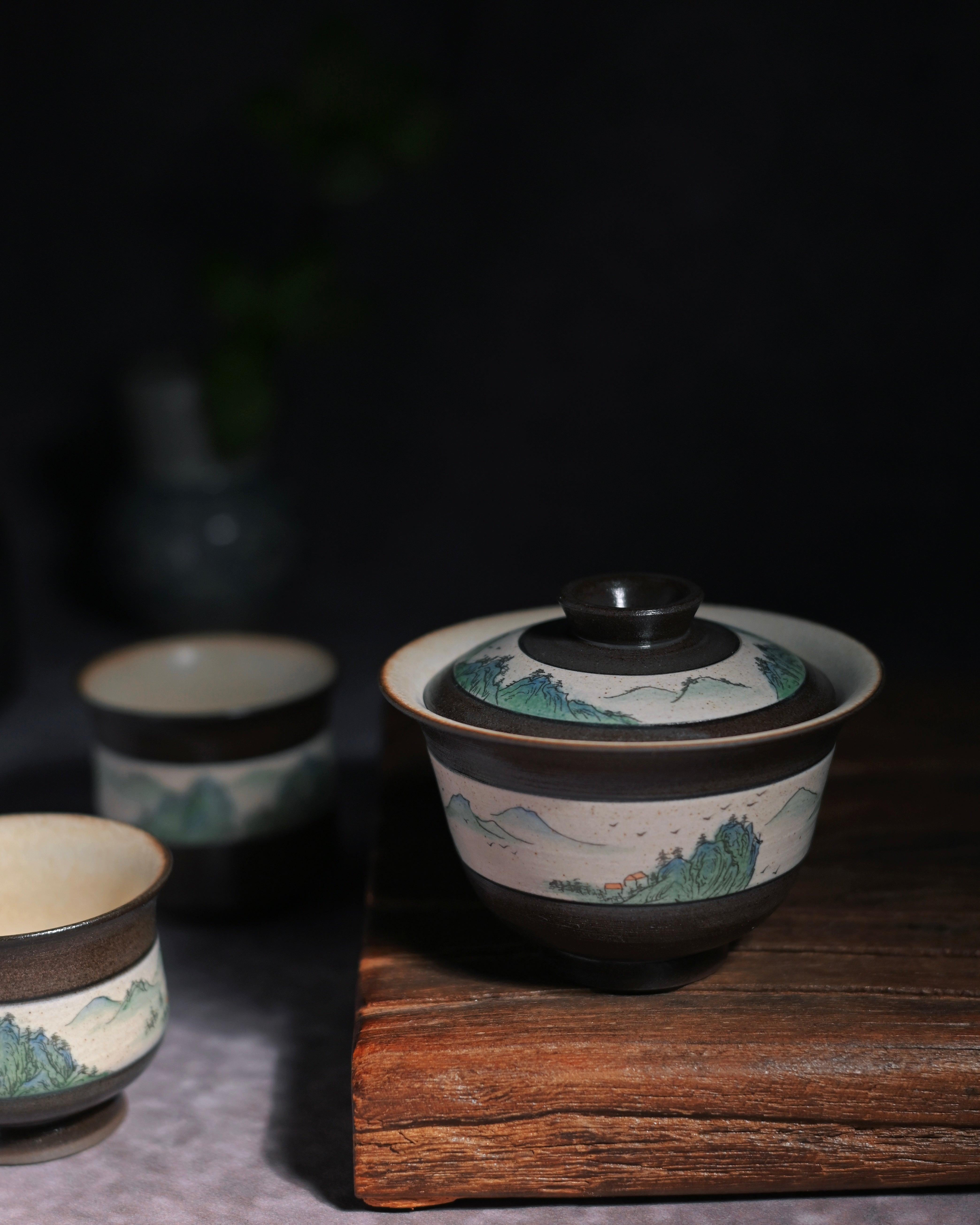 Blue-green landscape painting technique applied to gaiwan teacup with fine detailed brushwork by Kungfuyang