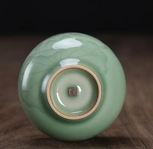 longquan celadon glaze teacup – Longquan Celadon Lotus Pattern Plum-green Teacup by Kungfuyang