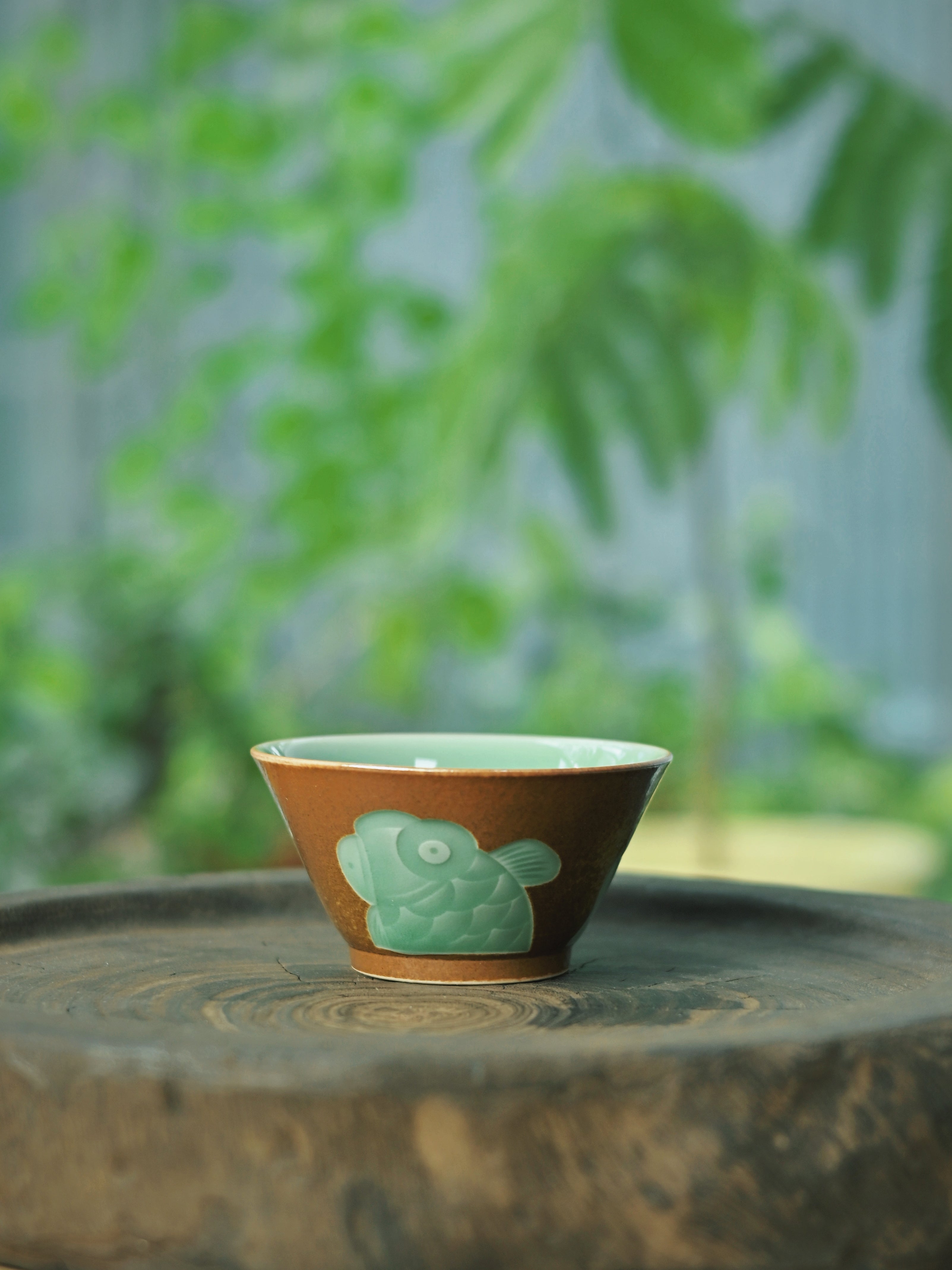 longquan celadon plum green puerh teacup – Longquan Celadon Ash and Plum Green Glaze Hand-Carved Fish by Kungfuyang