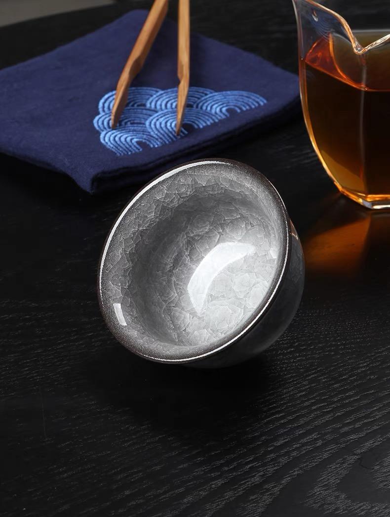 longquan celadon press hand cup ice – Longquan Celadon black ice-crack pattern Teacup by Kungfuyang