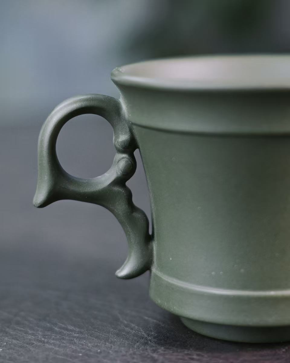 minimalist silhouette design teacup – Yixing Zisha Green Clay Handmade Side-Handle Teacup by Kungfuyang