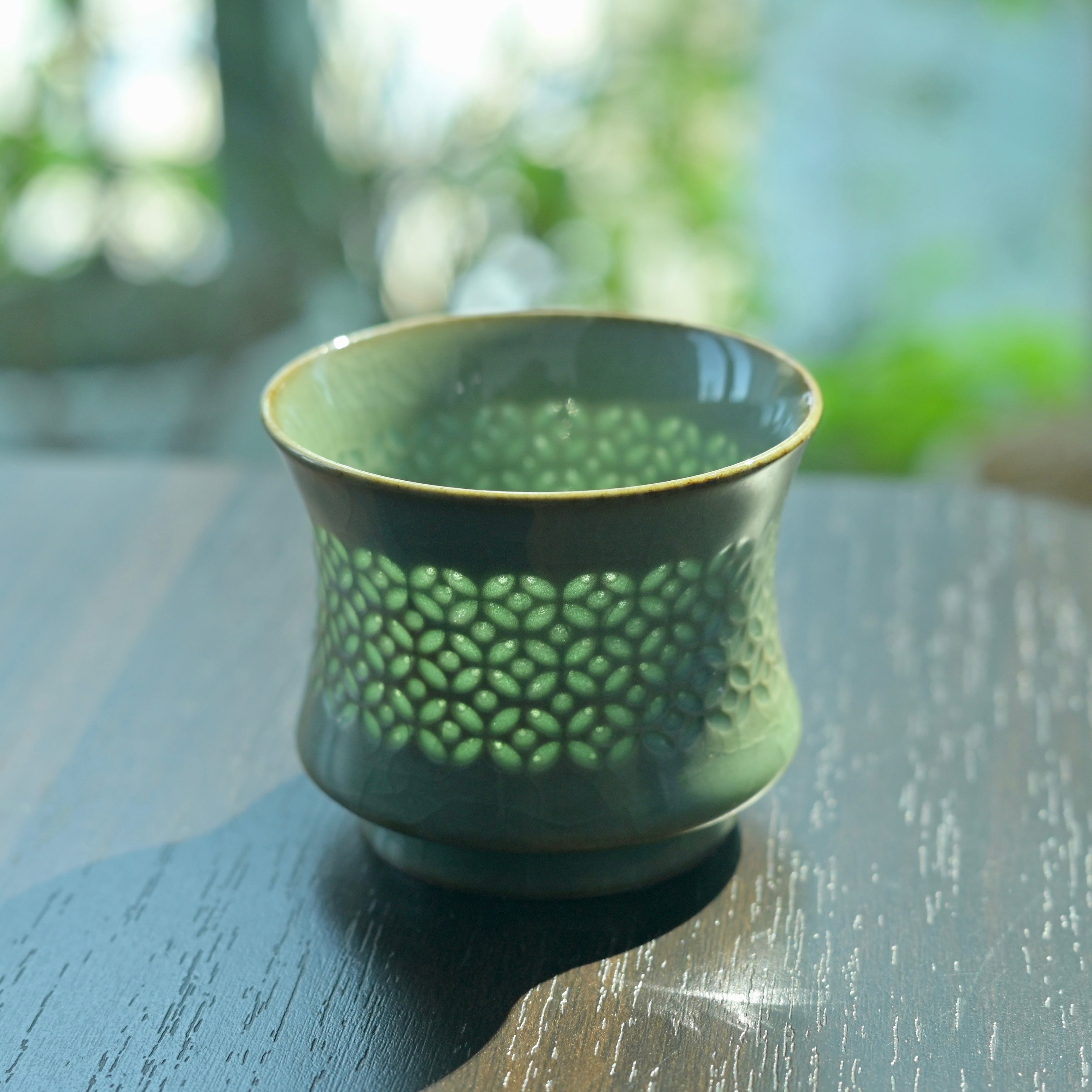 open work hollow carved celadon teacup – Longquan Celadon Handmade Underglaze Hollow-Carved Teacup( by Kungfuyang