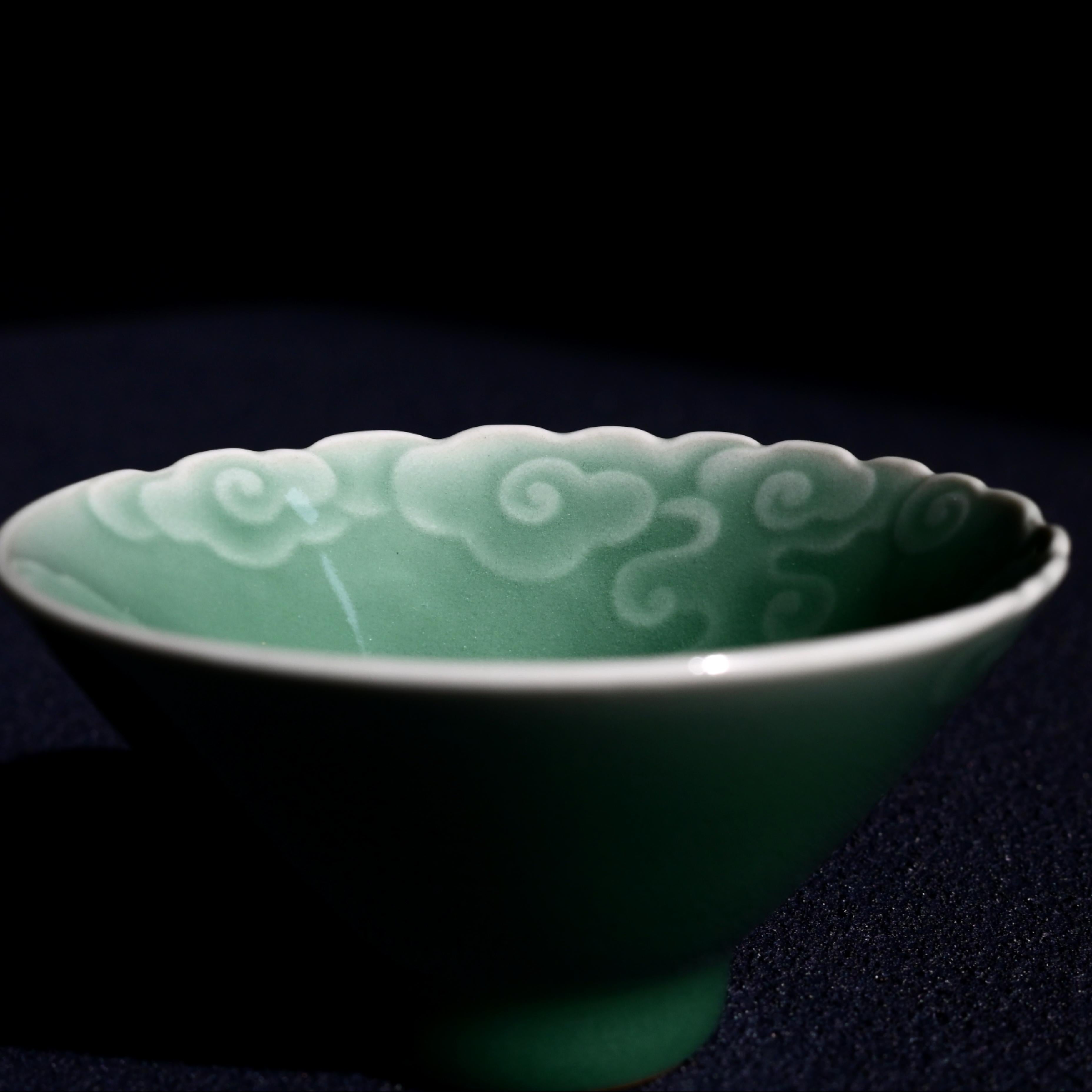 plum green glazed tea bowl – Longquan Celadon Embossed Cloud Patterns Teacup by Kungfuyang