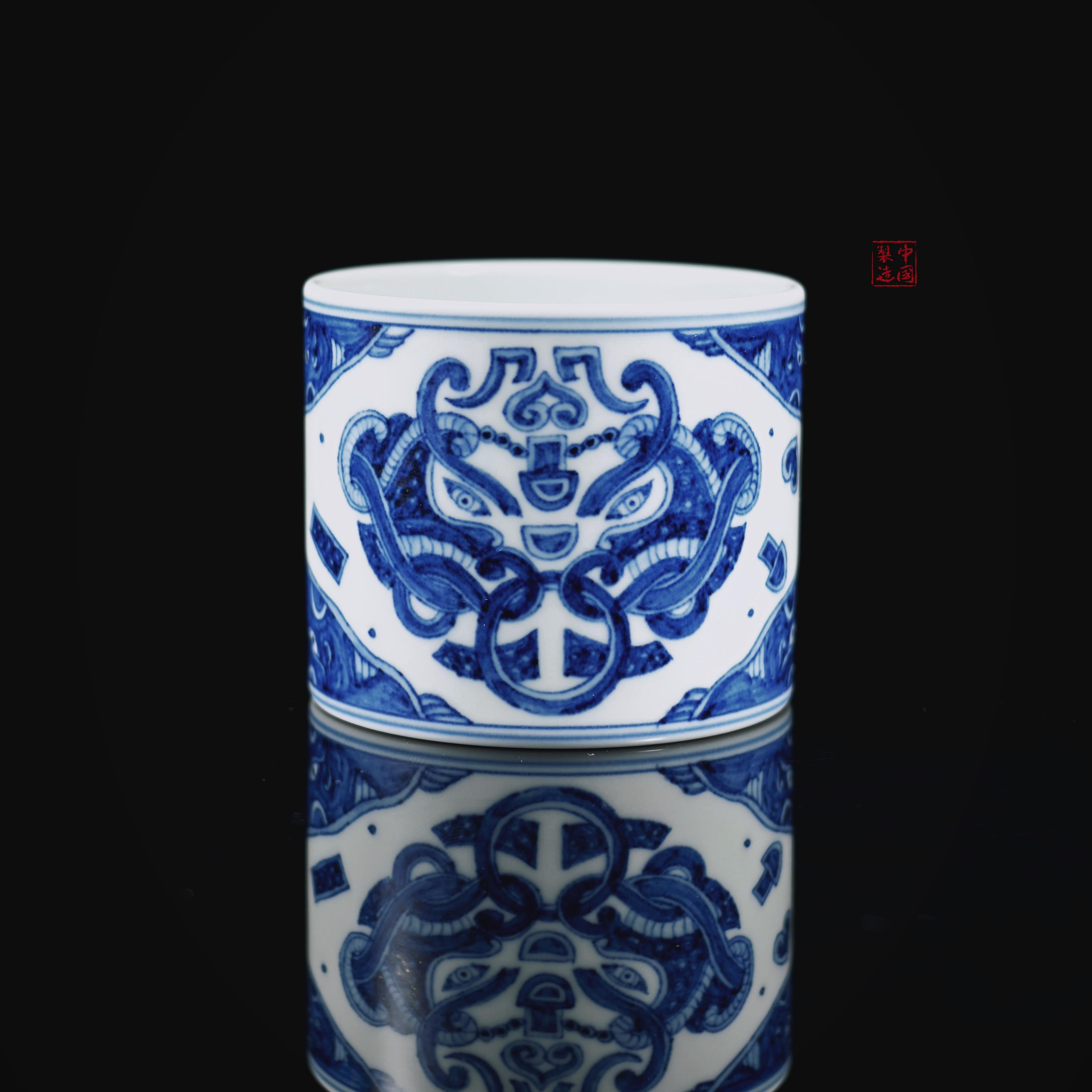 under glaze painted ceramic master teacup – Jingdezhen Blue-and-White “Taotie”(饕餮）Totem Master Teacup by Kungfuyang