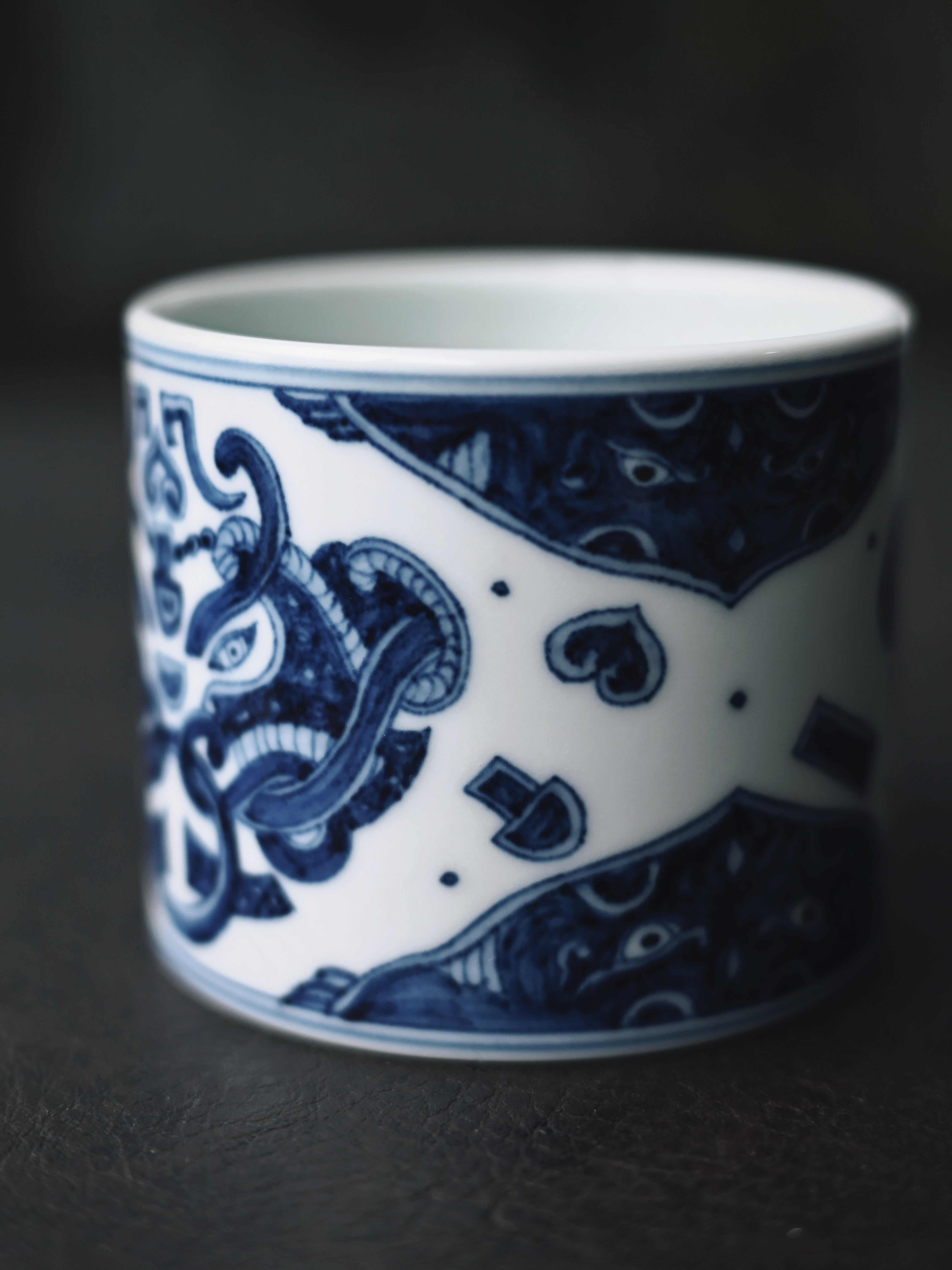 under glaze painted ceramic teacup – Jingdezhen Blue-and-White “Taotie”(饕餮）Totem Master Teacup by Kungfuyang