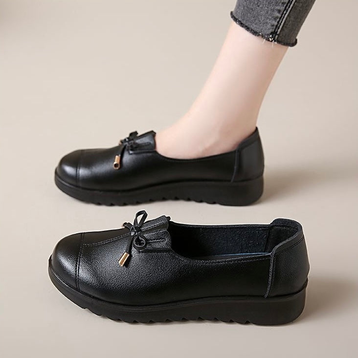Zapatos de cuero con suela blanda y superficie blanda