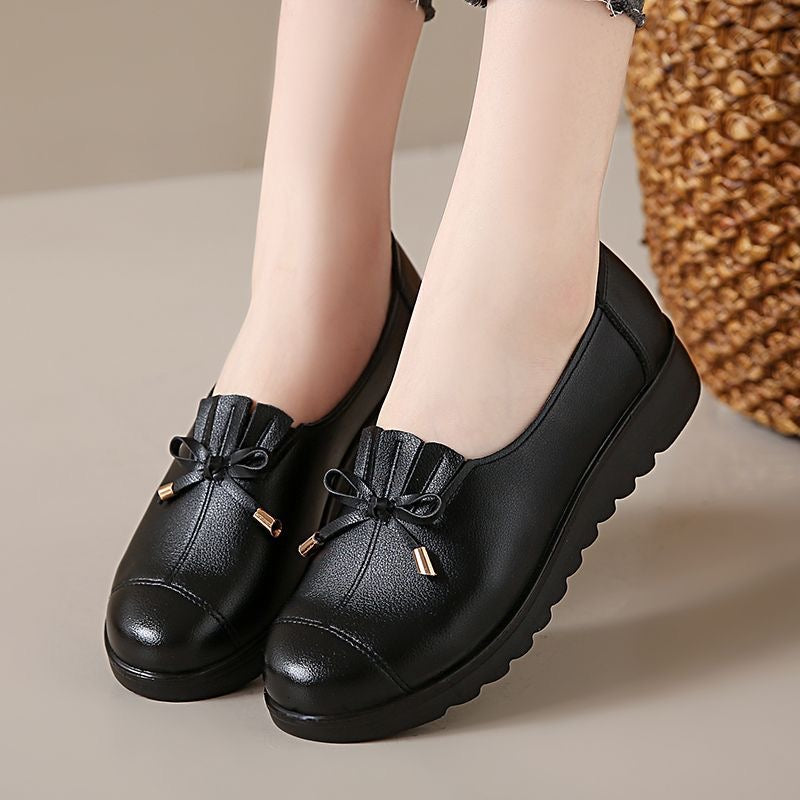 Zapatos de cuero con suela blanda y superficie blanda