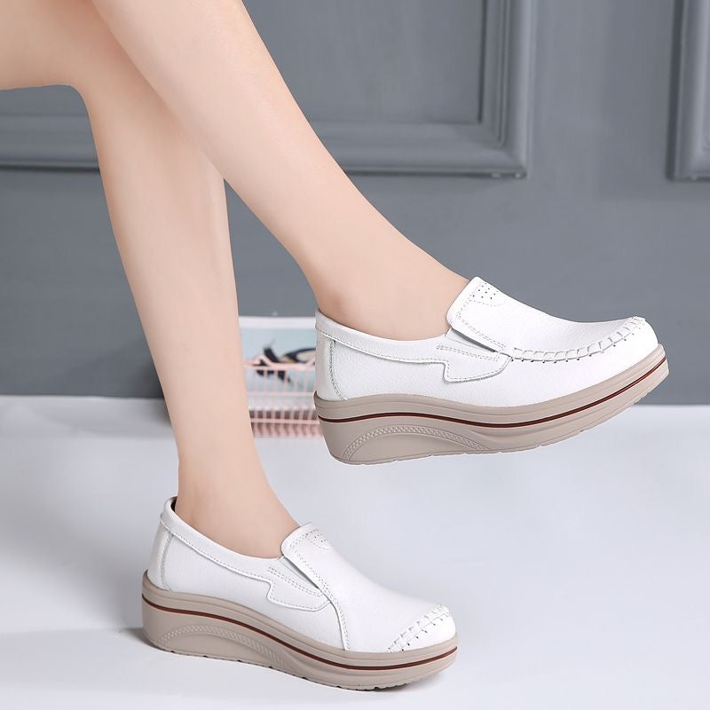 Zapatos de cuero de suela gruesa cosidos