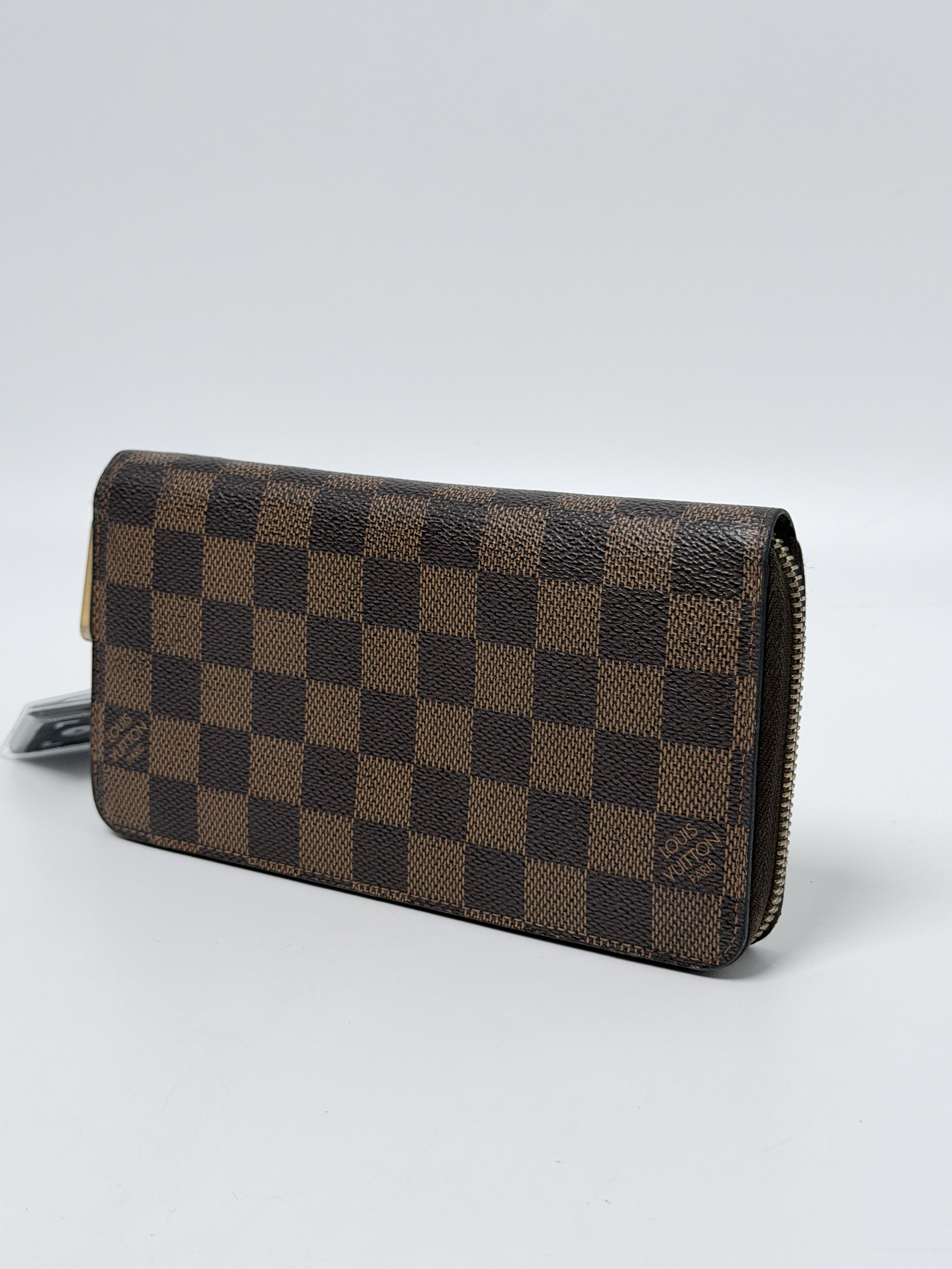 Damier Ébène Zippy Organizer Long Wallet JA1267LV