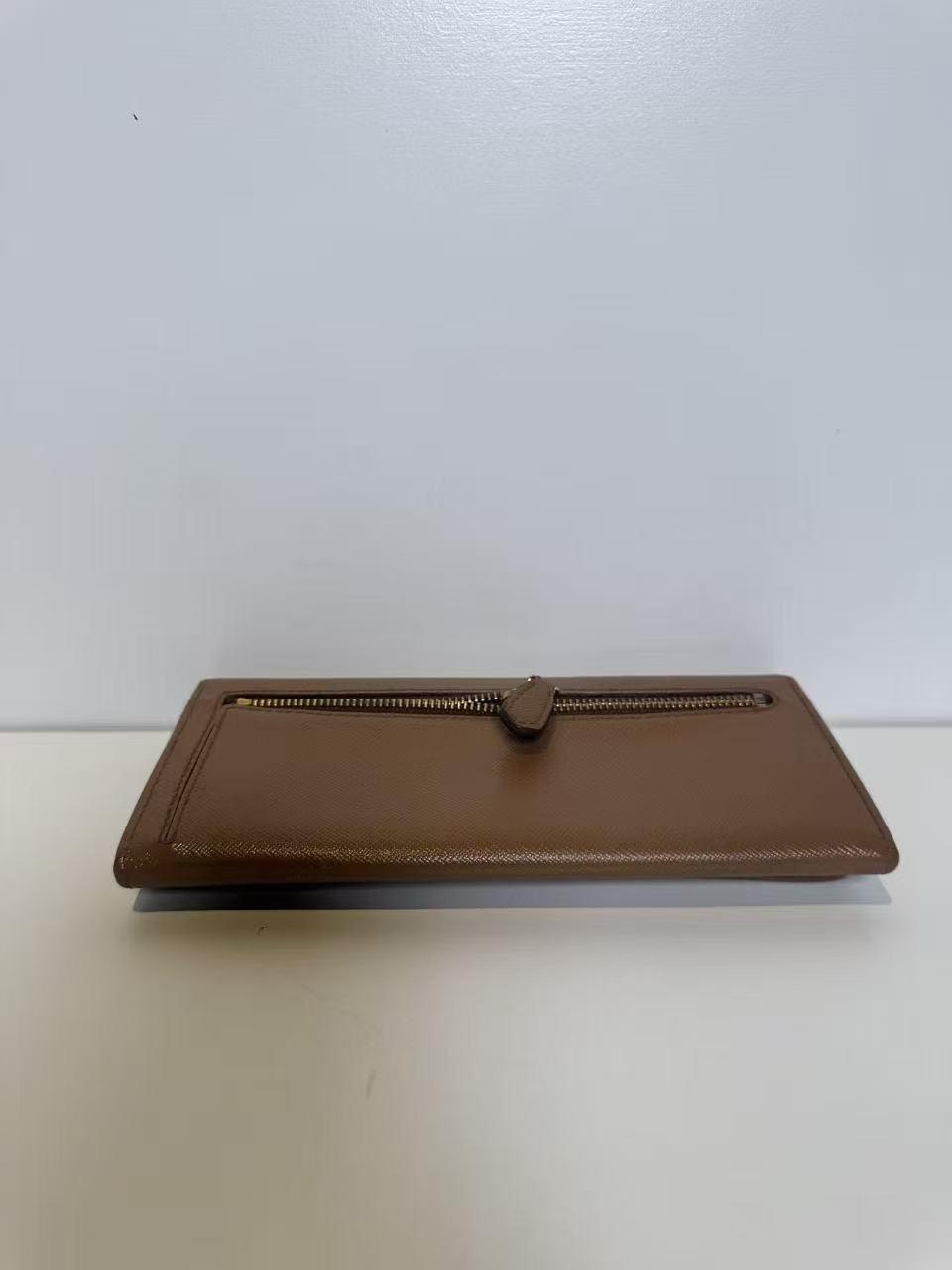 Pre-owned PRADA Leather Mini Bags Saffino wallet W7JX