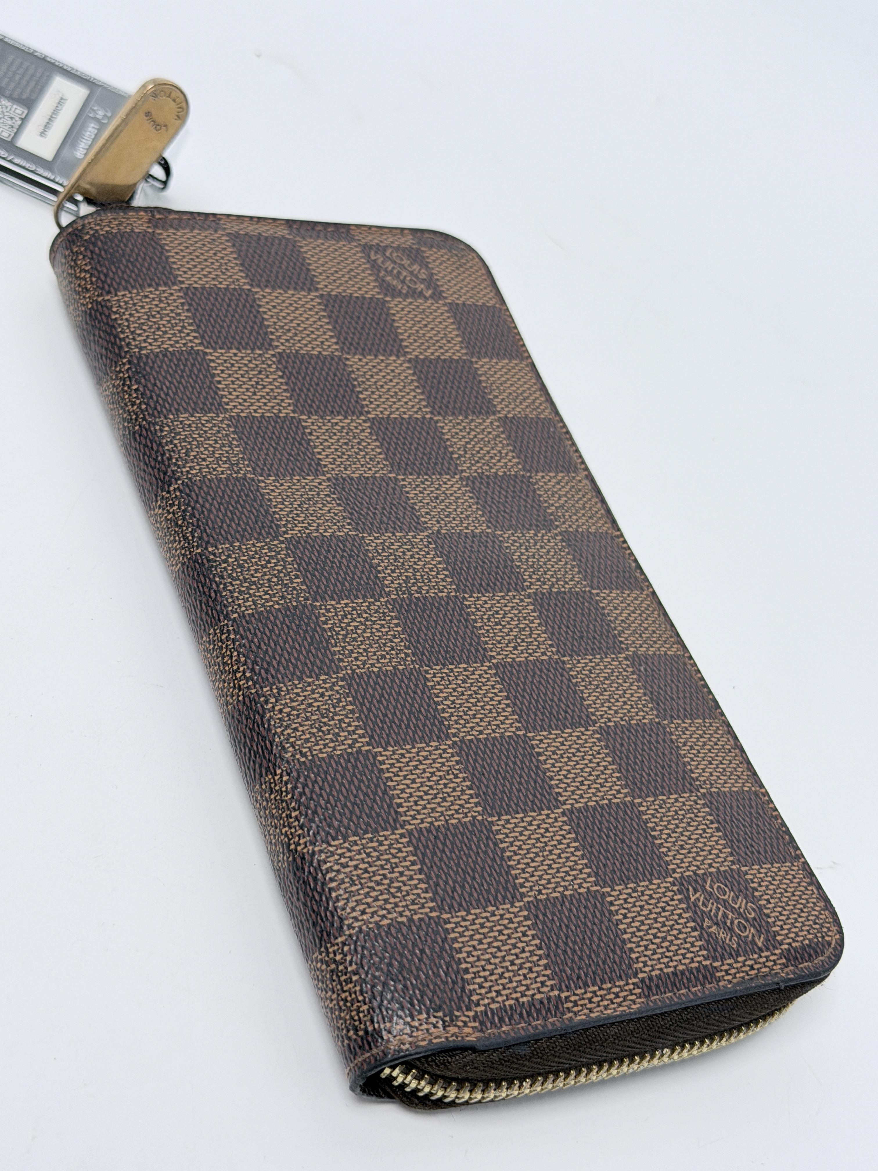 Damier Ébène Zippy Organizer Long Wallet JA1269LV