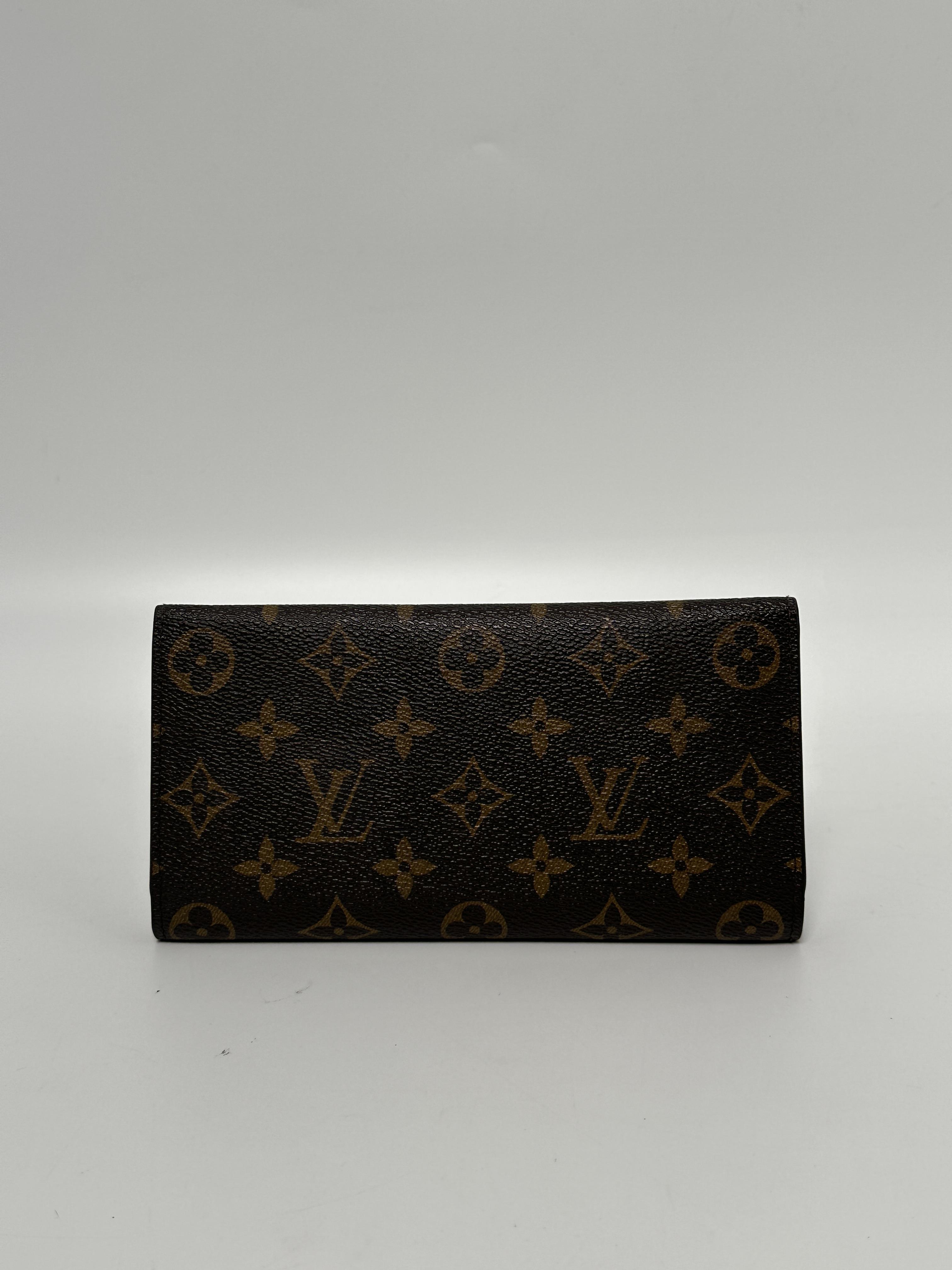 Monogram Emilie Long Flap Wallet Fuchsia JD279LV