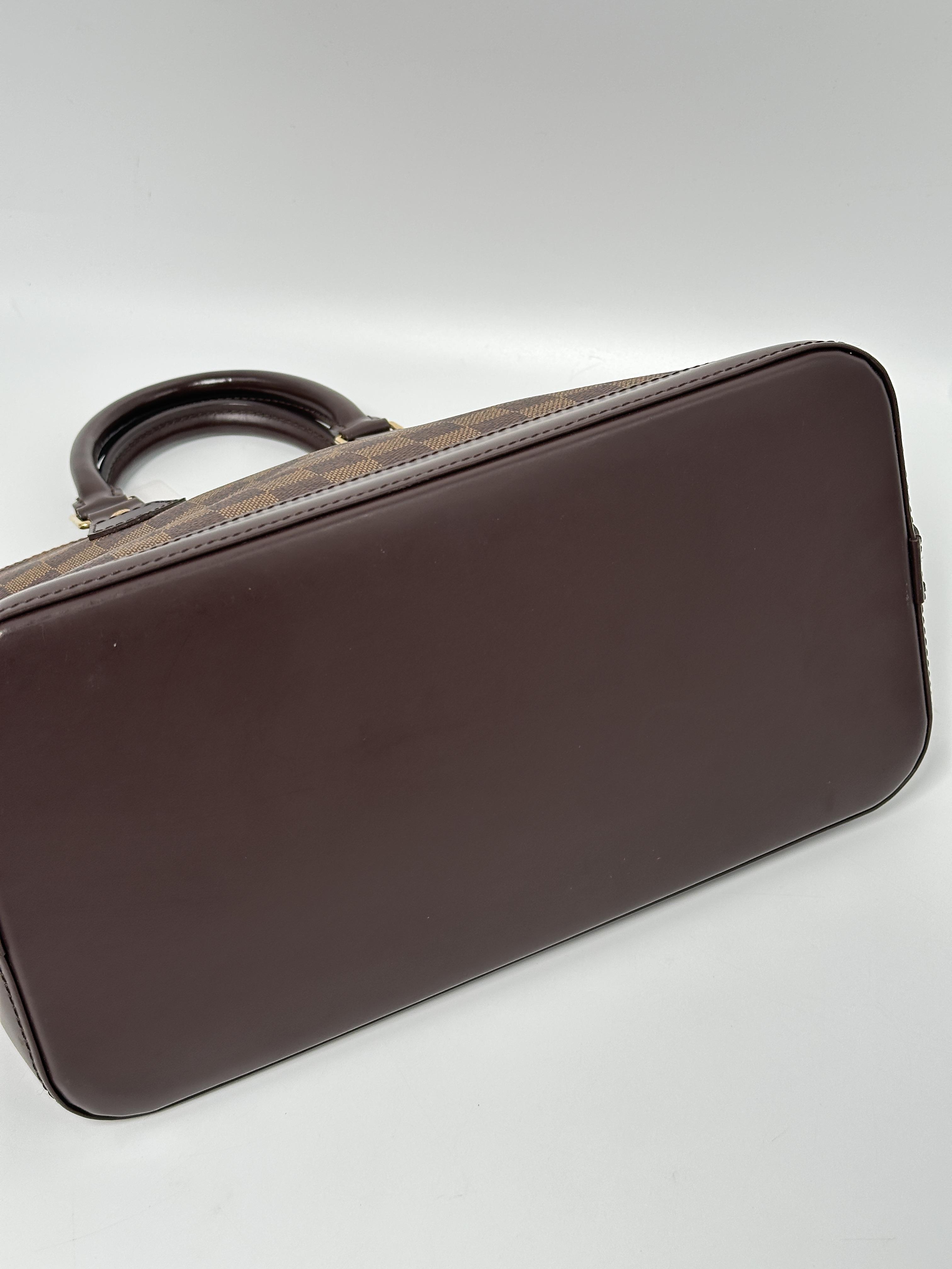 Damier Ebene Alma PM Top Handle Bag JE1061LV