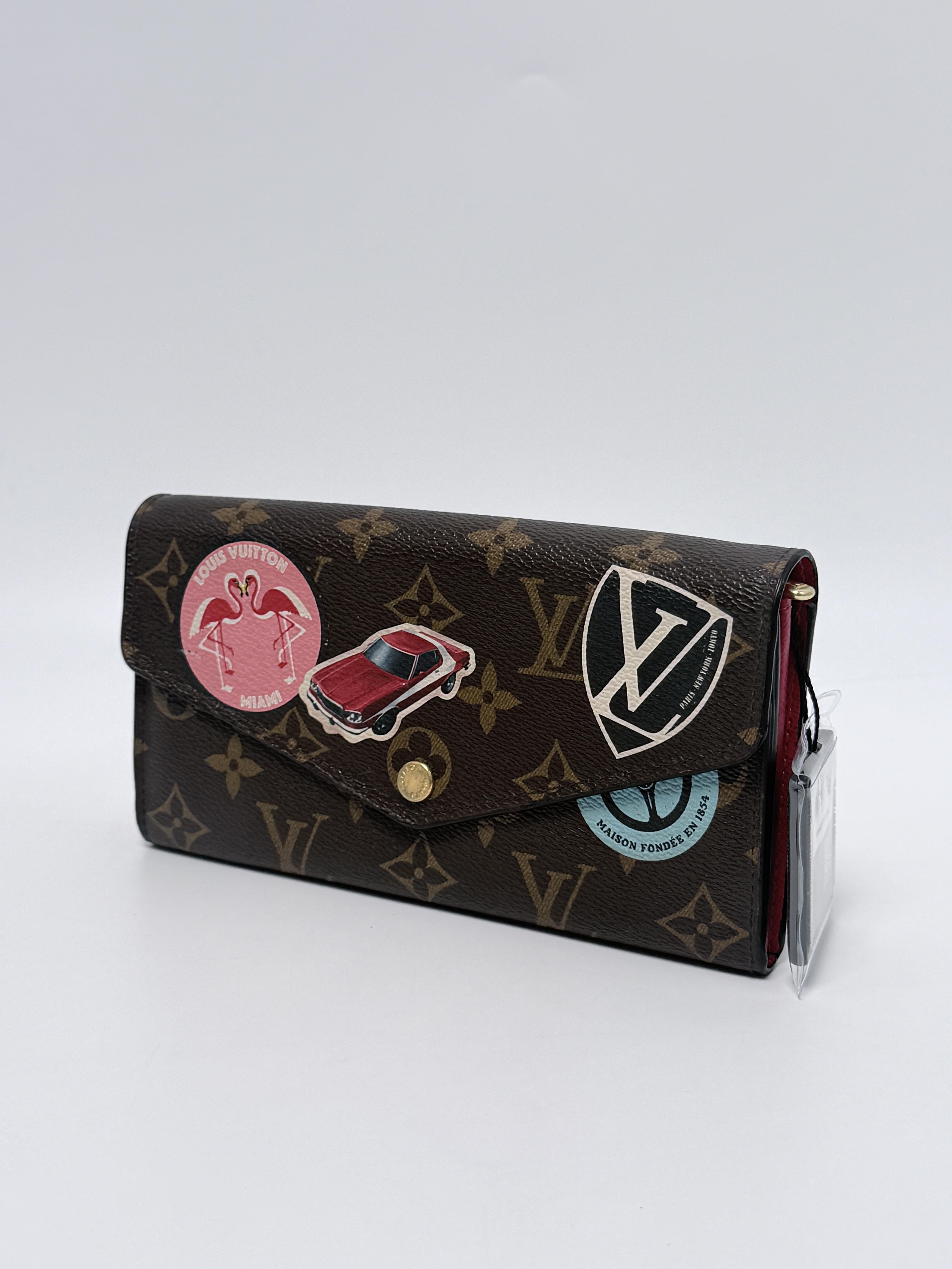 Limited Edition Monogram World Tour Patches Sarah Wallet JD1293LV