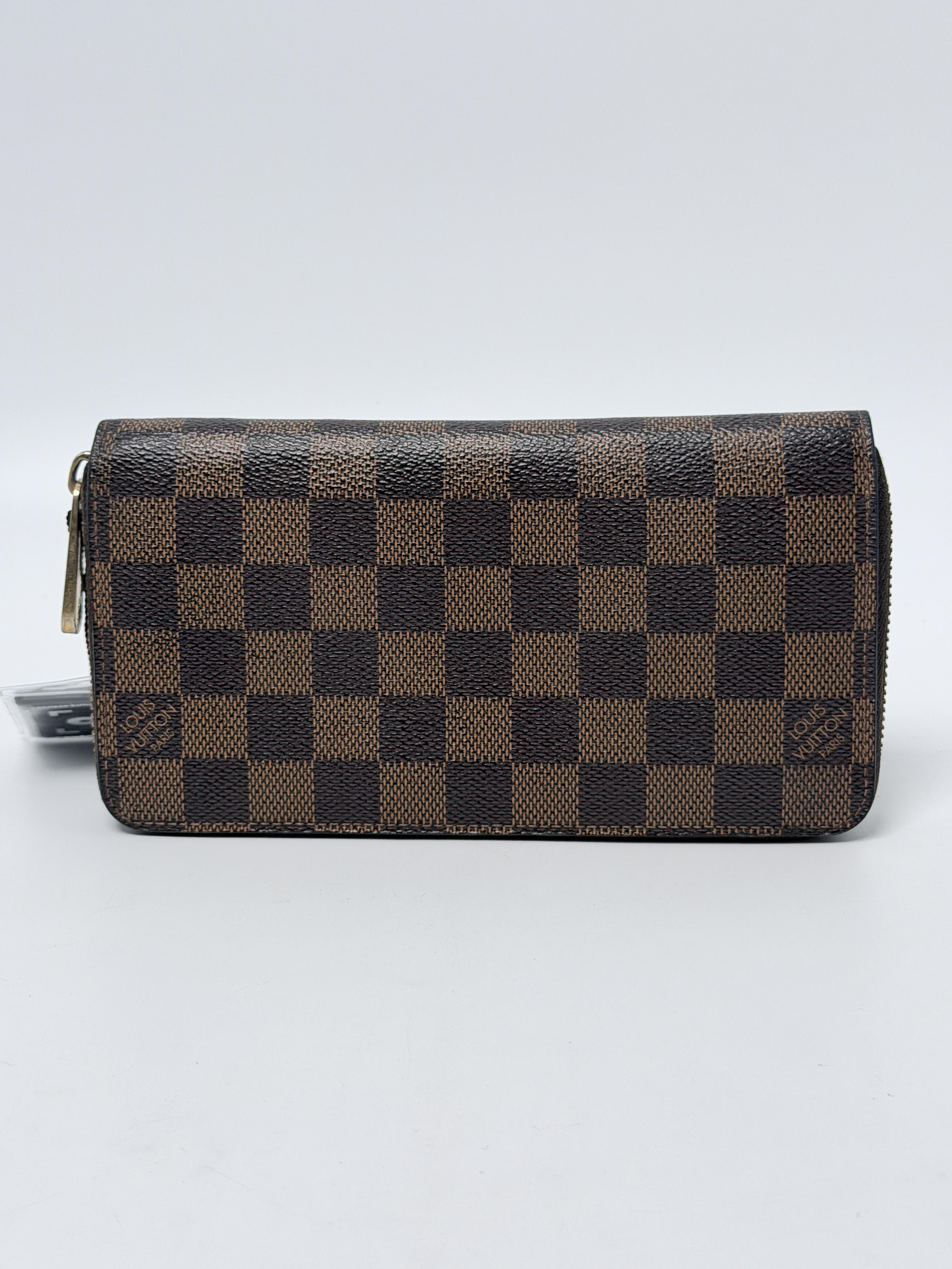 Damier Ébène Zippy Organizer Long Wallet JA1267LV