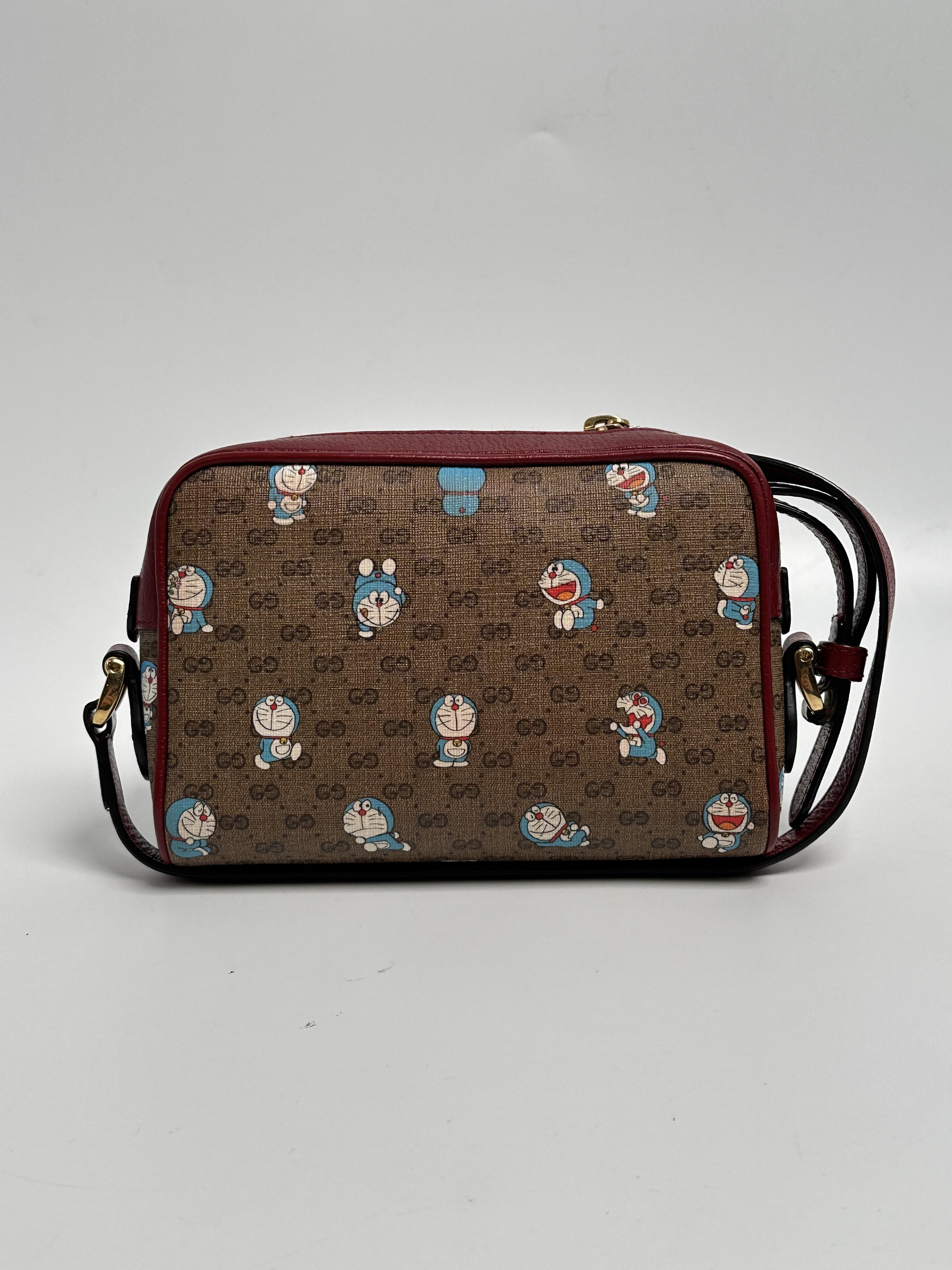 Pre-owned GUCCI canvas Crossbody Bags x Doraemon Mini Camera Crossbody Bag – GG Supreme Red JD373GG