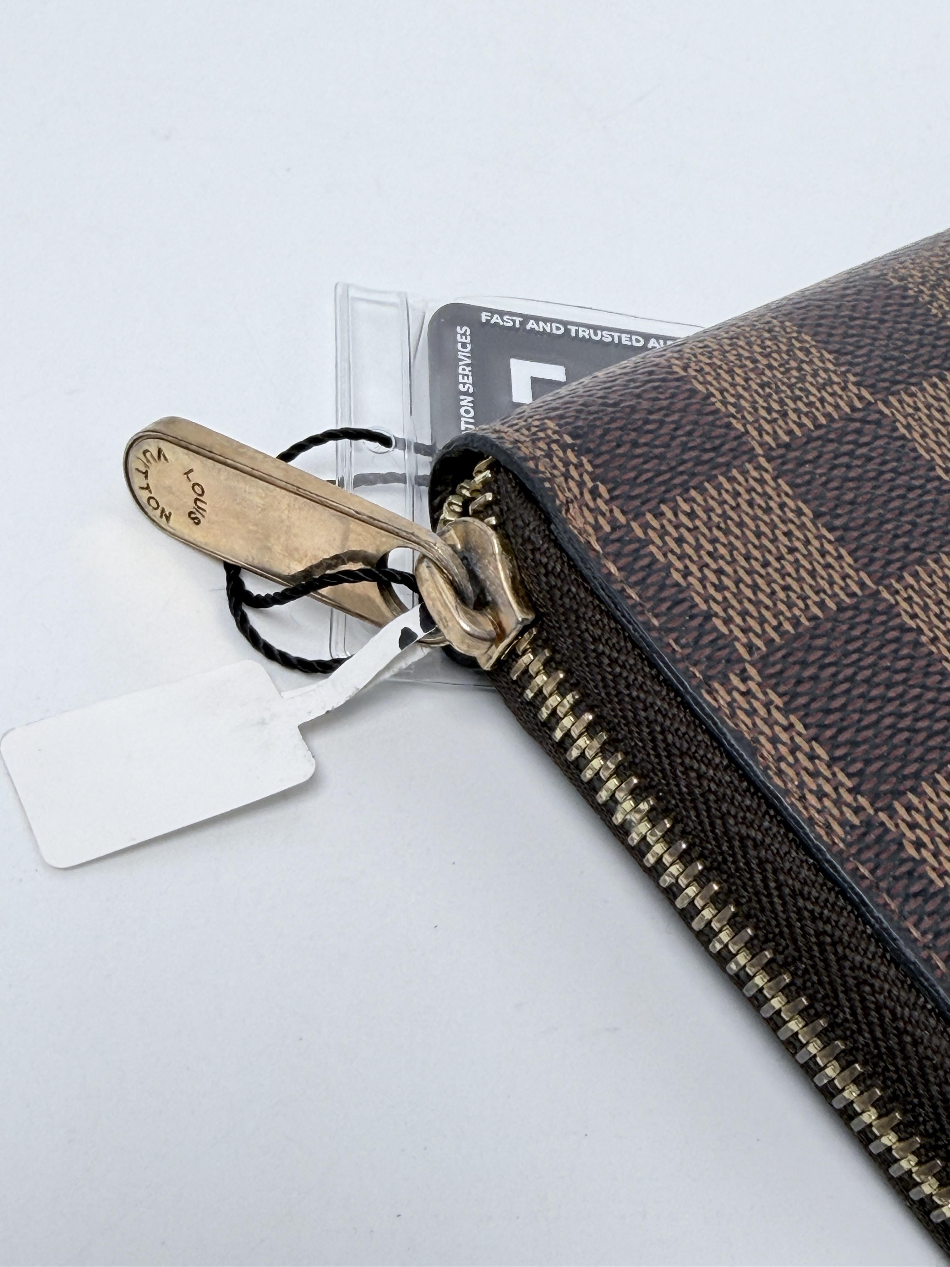 Damier Ébène Zippy Organizer Long Wallet JA1269LV