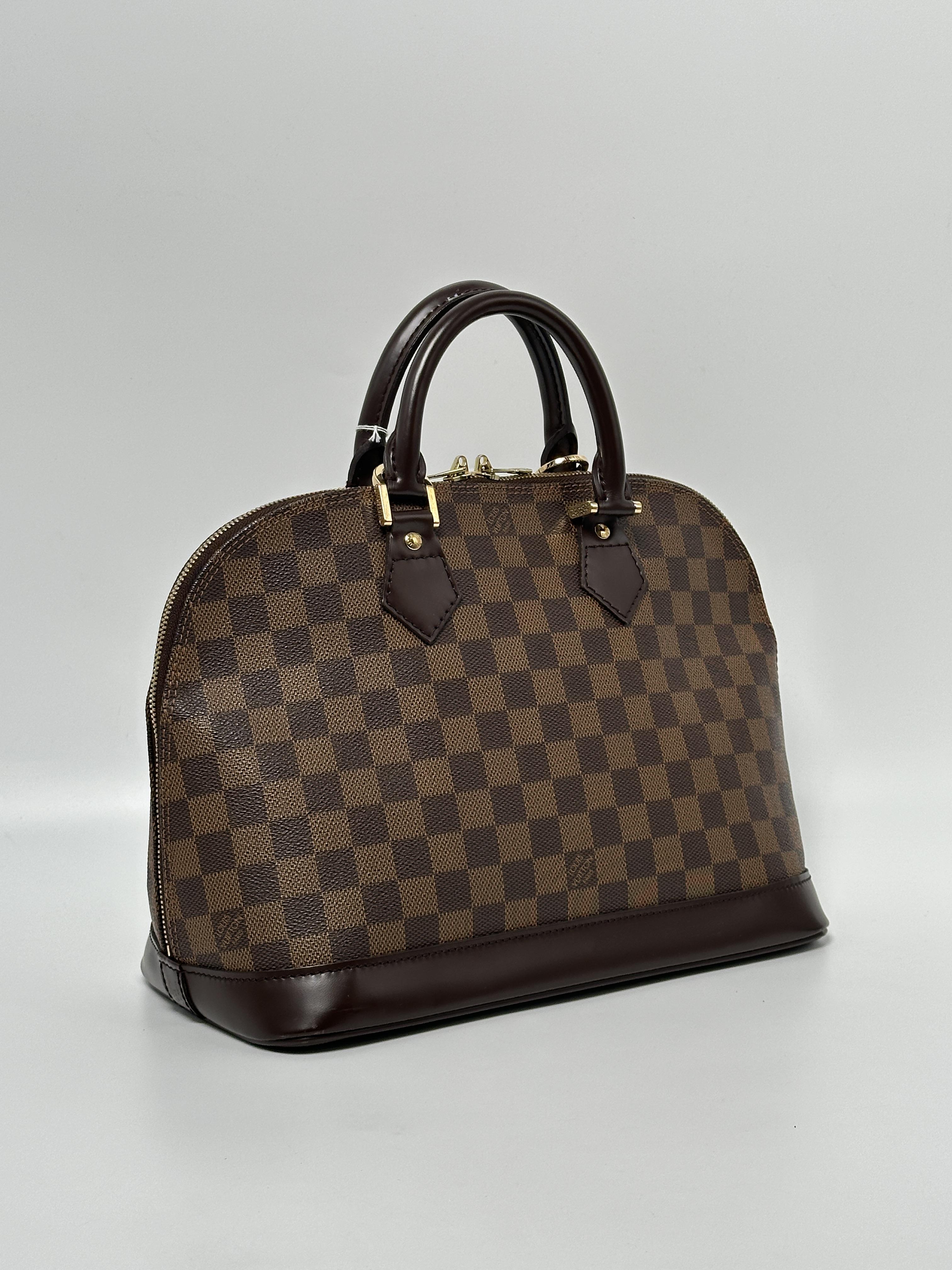 Damier Ebene Alma PM Top Handle Bag JE1060LV