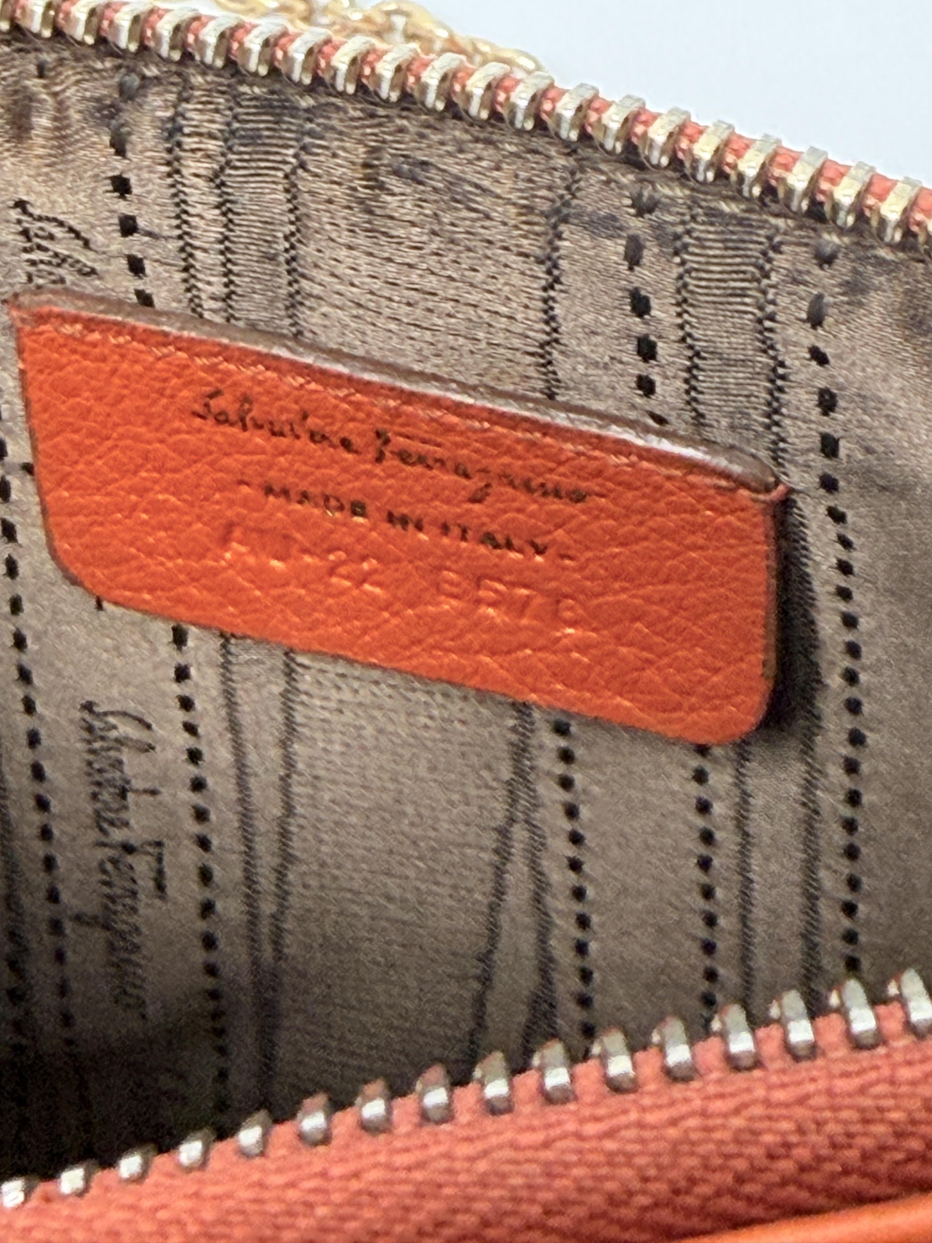 Gancini Script Logo Pebbled Chain Pochette Bag Orange JD1500FG