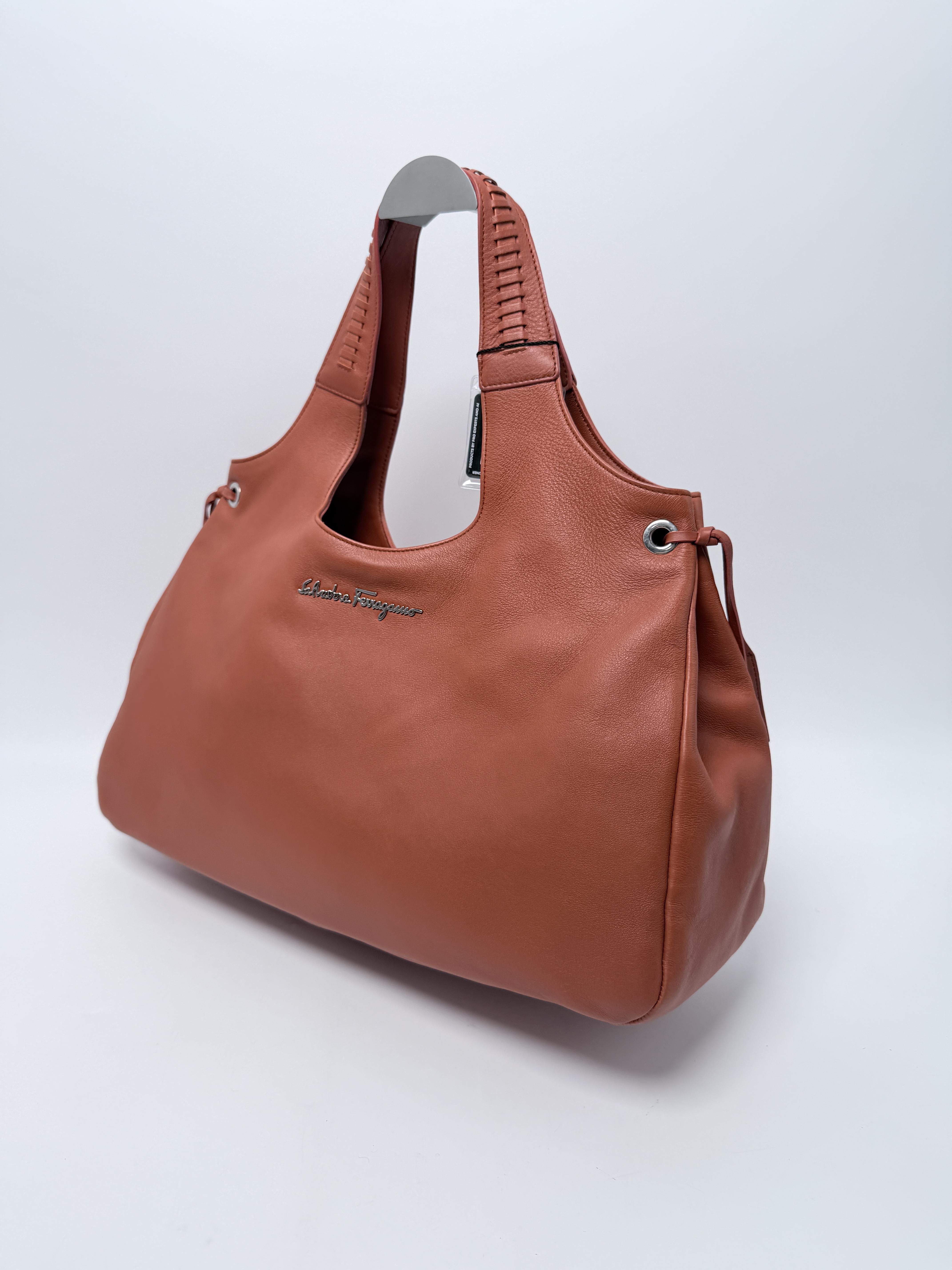 Gancini Script Logo Pebbled Hobo Shoulder Bag Orange JD1595FG