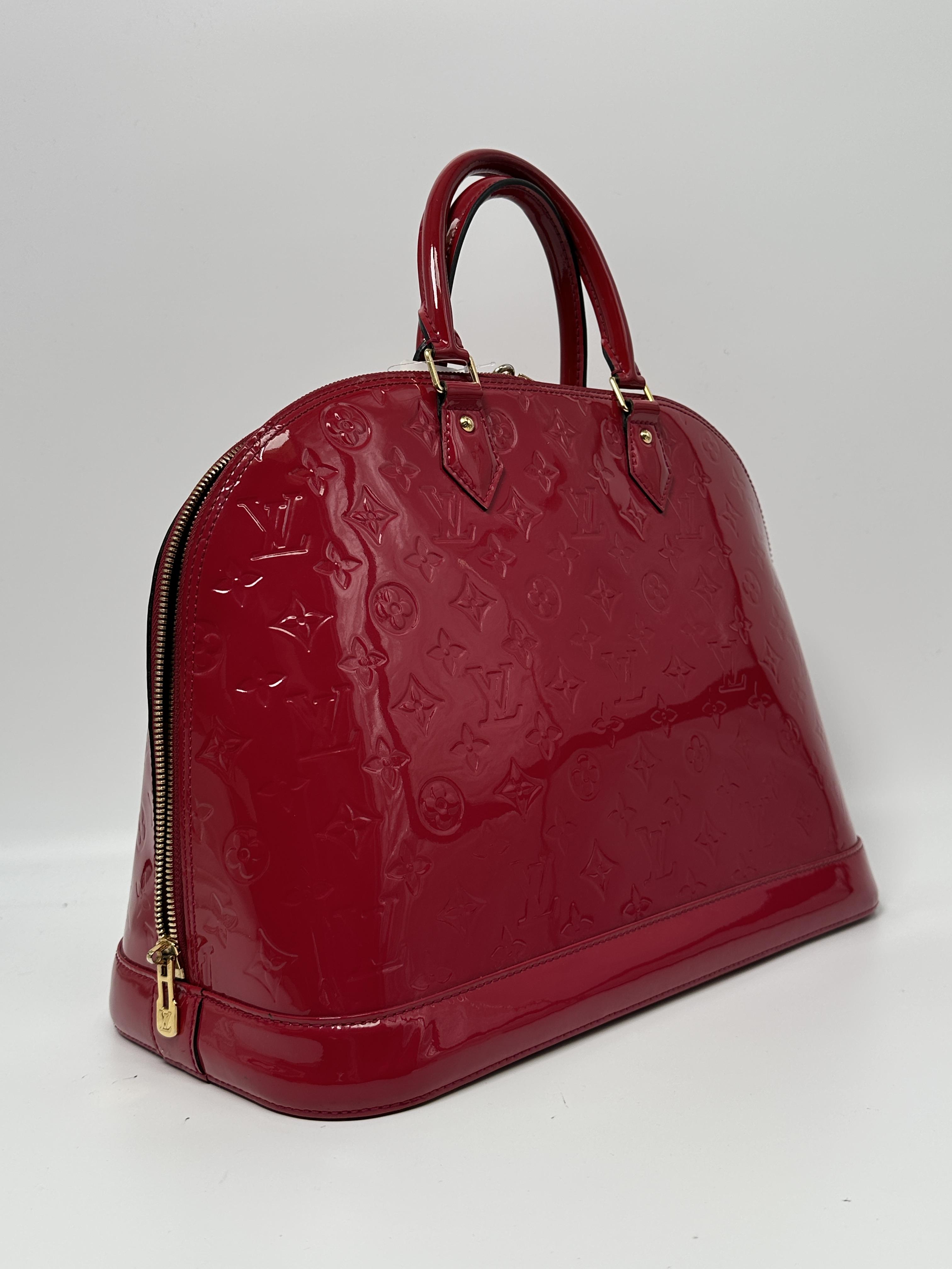 Alma PM Monogram Vernis Rouge Handbag HB019LV