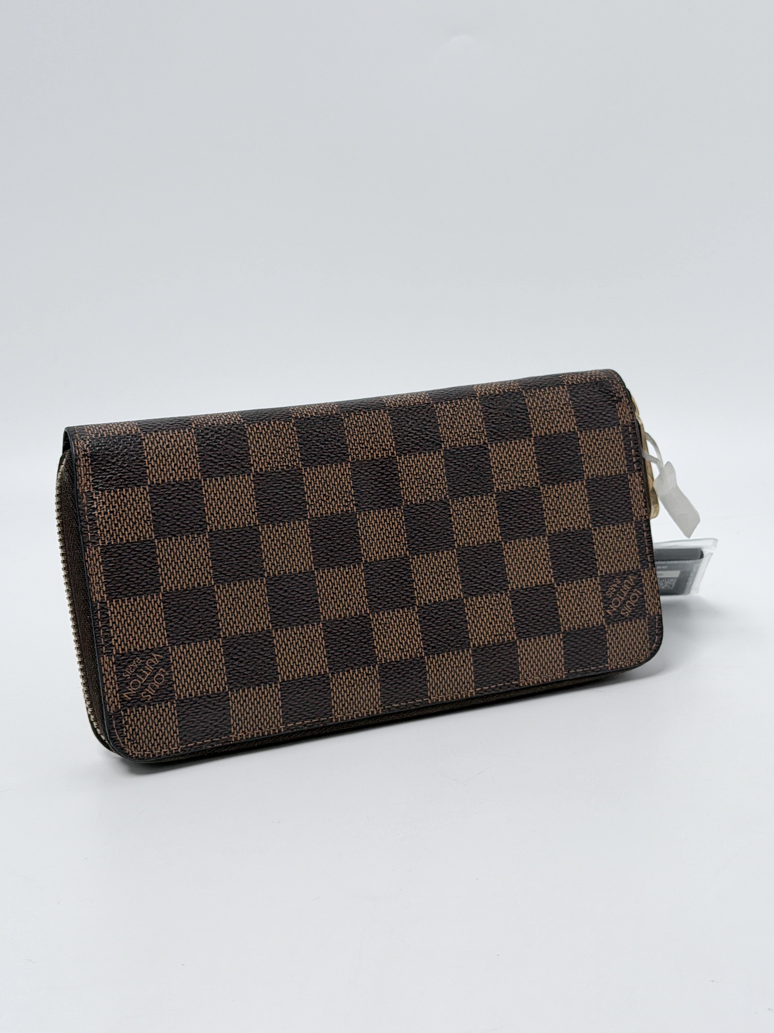 Damier Ébène Zippy Organizer Long Wallet JA1267LV