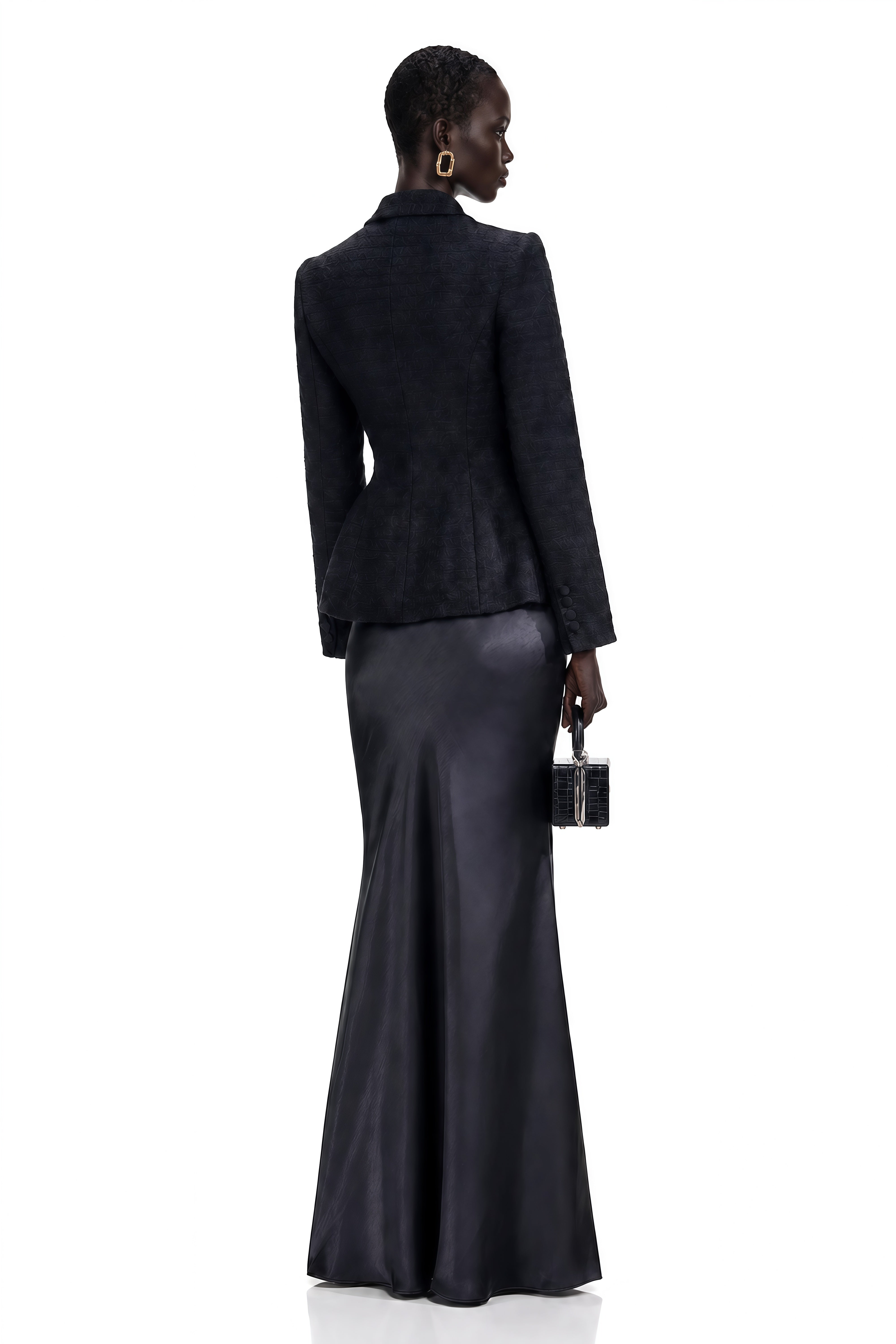 Black blazer paired with a black satin maxi skirt