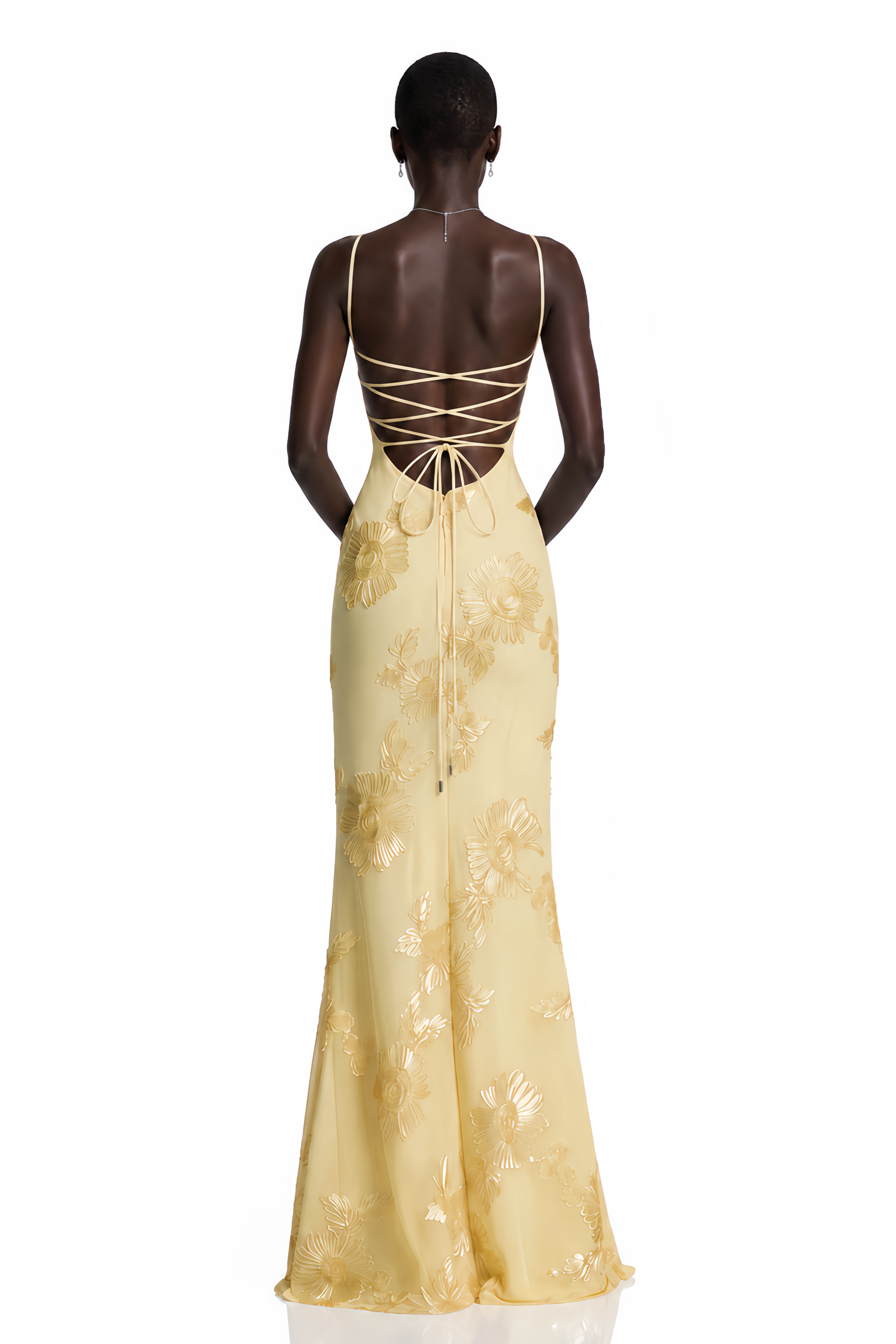 Yellow spaghetti strap gown with a floral-embroidered corset bodice