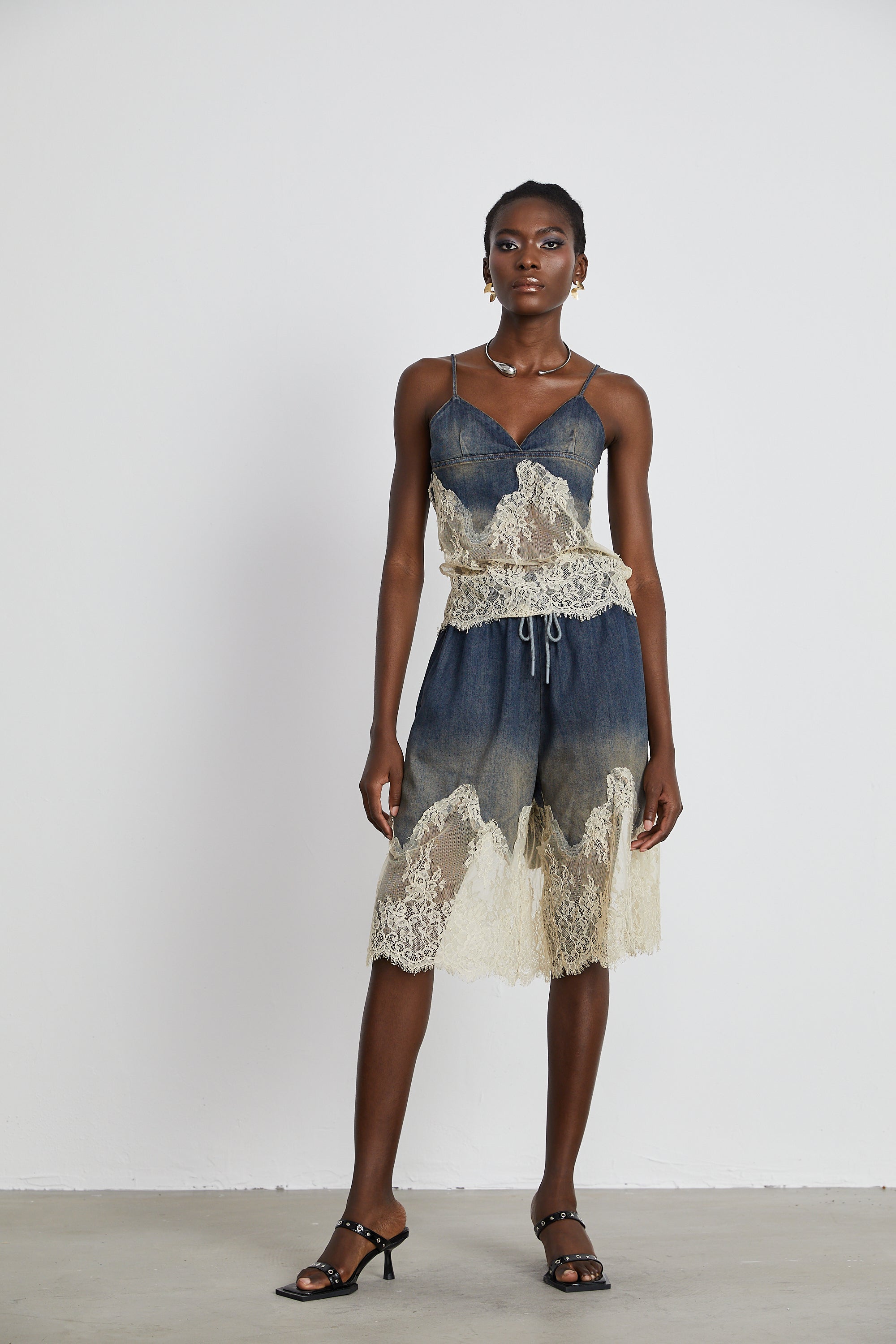 Blue denim camisole and matching skirt with delicate cream lace overlays