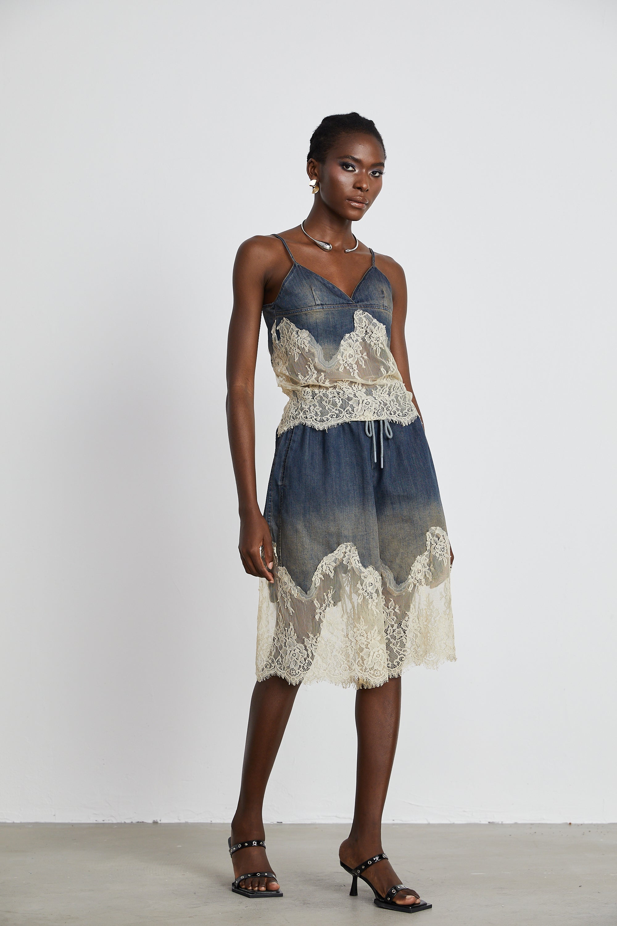 Blue denim camisole and matching skirt with delicate cream lace overlays