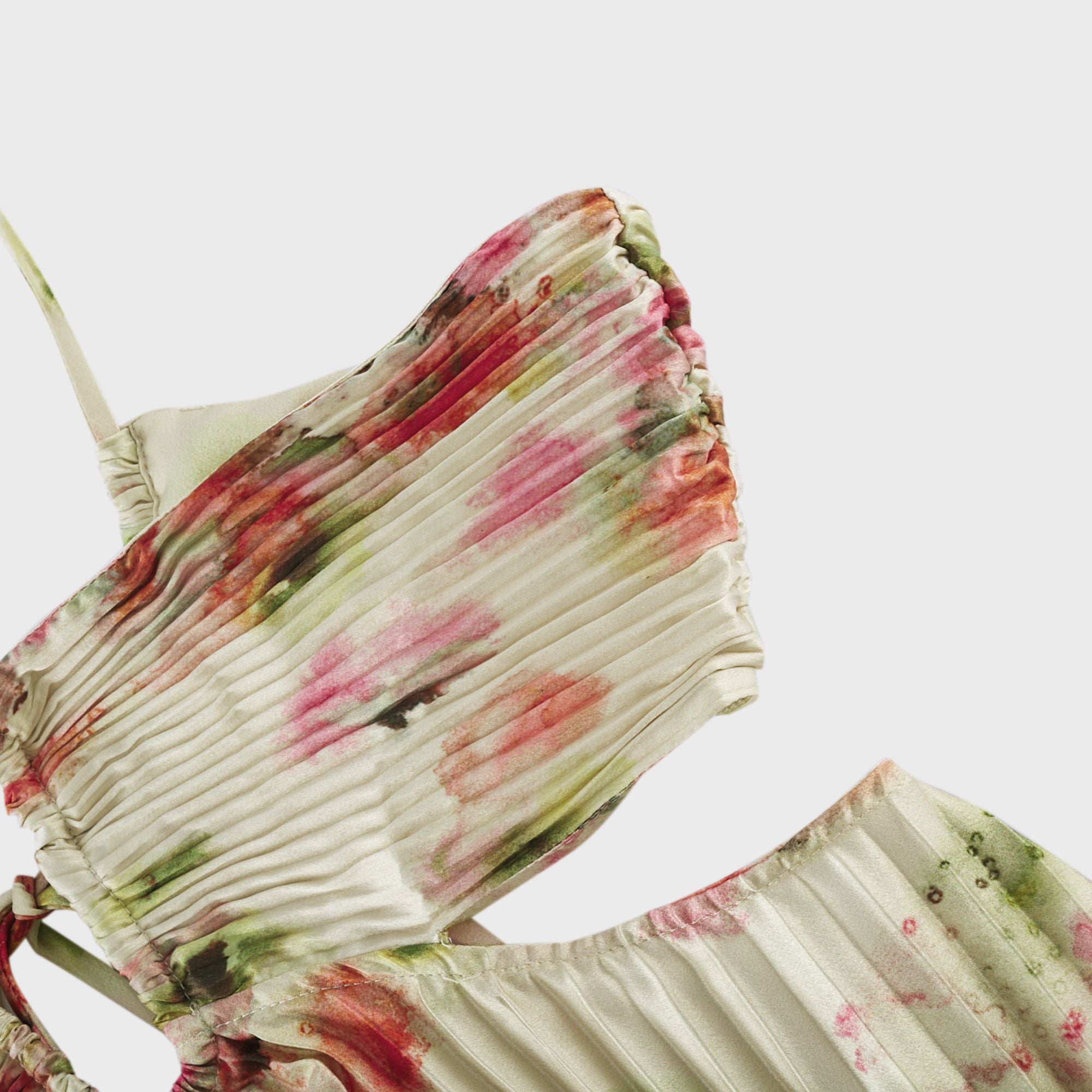 Floral pleated halter gown with side cutouts